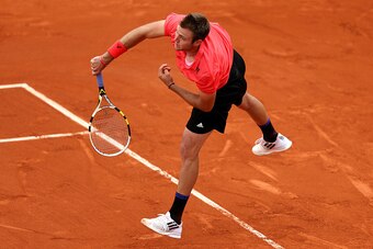 PARIS, FRANCE - MAY 26:  Jack Sock of the United States serves in his Men's Singles match against Grigor Dimitrov of Bulgaria on day three of the 2015 French Open at Roland Garros on May 26, 2015 in Paris, France.  (Photo by Clive Brunskill/Getty Images)