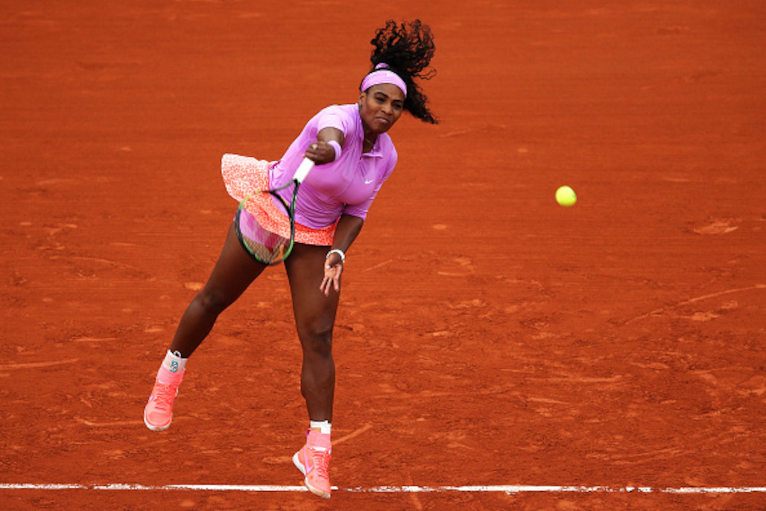 PARIS, FRANCE - MAY 26:  Serena Williams of the United States serves during her Women's Singles match against Andrea Hlavackova of Czech Republic on day three of the 2015 French Open at Roland Garros on May 26, 2015 in Paris, France.  (Photo by Clive Brun