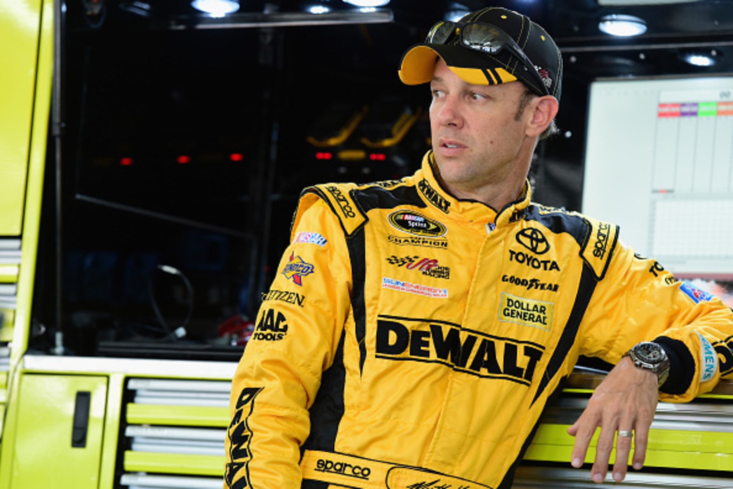 CHARLOTTE, NC - MAY 23: Matt Kenseth, driver of the #20 DeWalt Toyota, stands in the garage area during practice for the NASCAR Sprint Cup Series Coca-Cola 600 at Charlotte Motor Speedway on May 23, 2015 in Charlotte, North Carolina. (Photo by Jared C. CHARLOTTE, NC - MAY 23: Matt Kenseth, driver of the #20 DeWalt Toyota, stands in the garage area during practice for the NASCAR Sprint Cup Series Coca-Cola 600 at Charlotte Motor Speedway on May 23, 2015 in Charlotte, North Carolina. (Photo by Jared C.