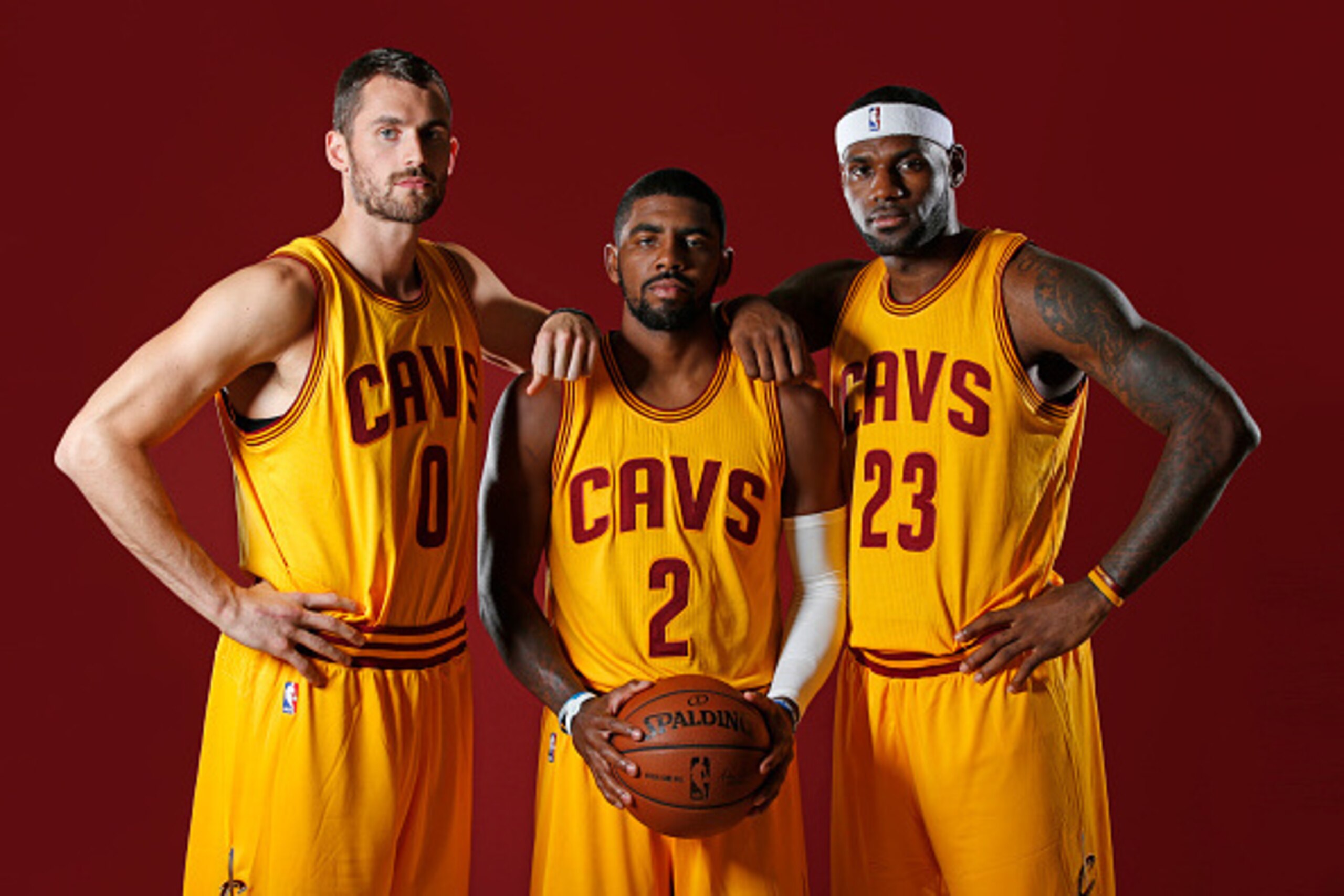 INDEPENDENCE, OH - SEPTEMBER 26: Kevin Love #0, Kyrie Irving #2 and LeBron James #23 of the Cleveland Cavaliers poses for a photo during media day on September 26, 2014 at the Cleveland Clinic Courts in Independence, Ohio. NOTE TO USER: User expressly a INDEPENDENCE, OH - SEPTEMBER 26: Kevin Love #0, Kyrie Irving #2 and LeBron James #23 of the Cleveland Cavaliers poses for a photo during media day on September 26, 2014 at the Cleveland Clinic Courts in Independence, Ohio. NOTE TO USER: User expressly a