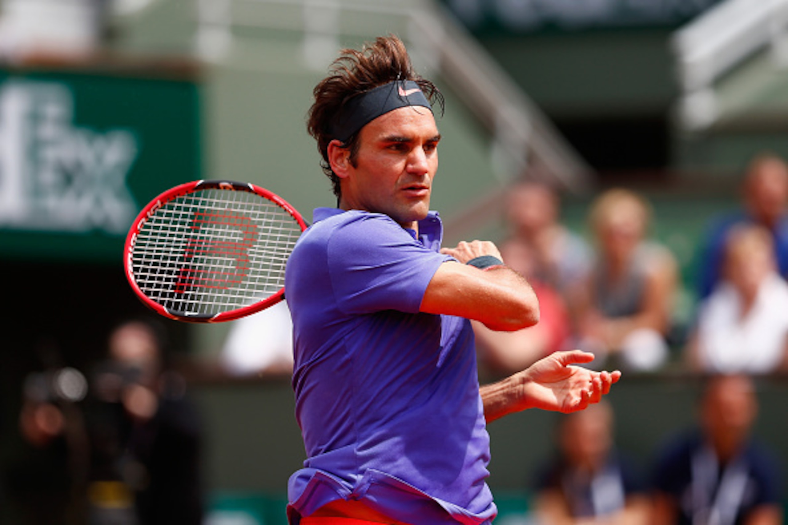 PARIS, FRANCE - MAY 24:  Roger Federer of Switzerland plays a forehand during his Men's Singles match against Alejandro Falla of Colombia on day one of the 2015 French Open at Roland Garros on May 24, 2015 in Paris, France.  (Photo by Julian Finney/Getty 