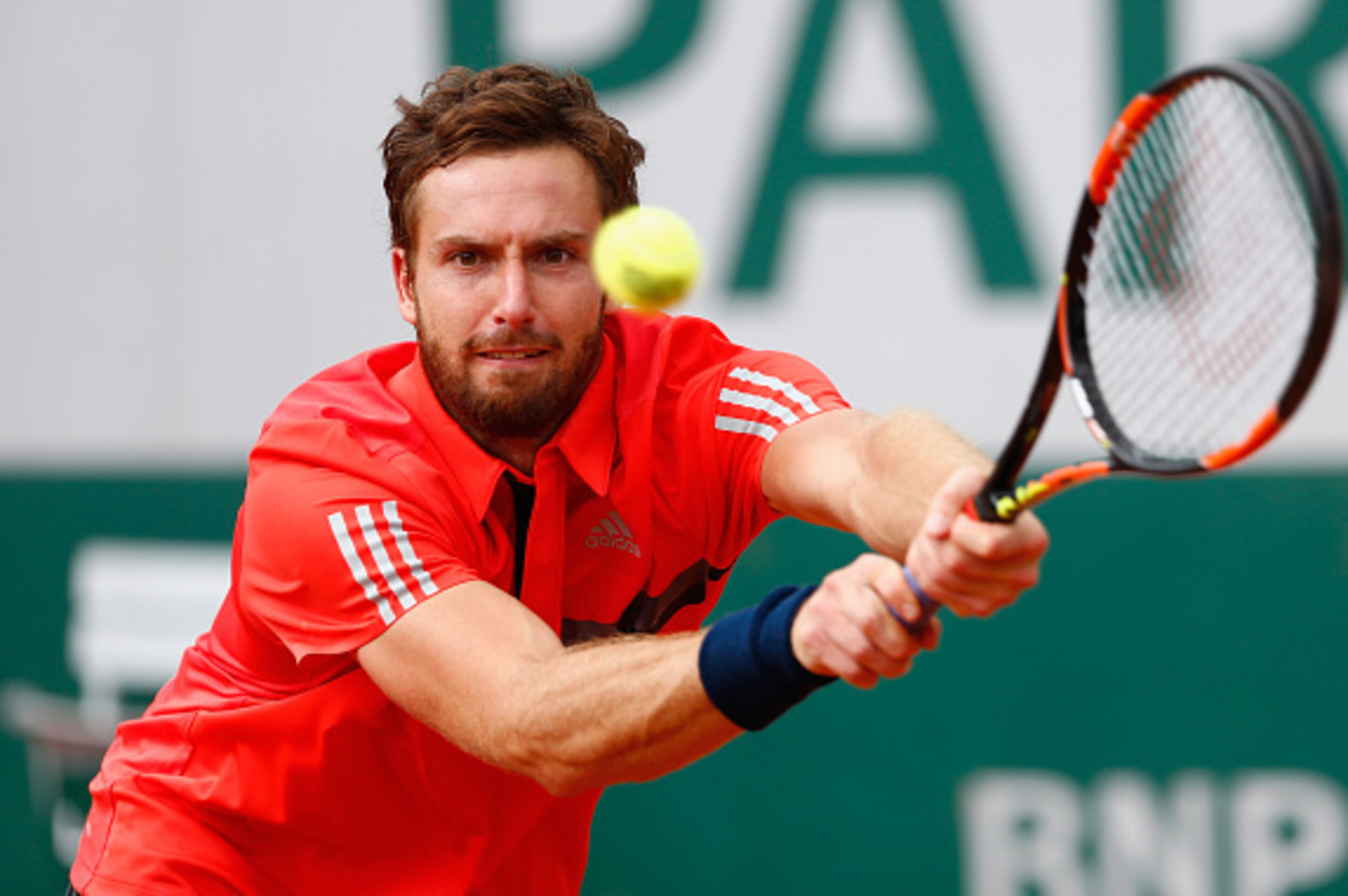 PARIS, FRANCE - MAY 24:  Ernests Gulbis of Latvia plays a forehand during his Men's Singles match against Igor Sijsling of Netherlands on day one of the 2015 French Open at Roland Garros on May 24, 2015 in Paris, France.  (Photo by Julian Finney/Getty Ima
