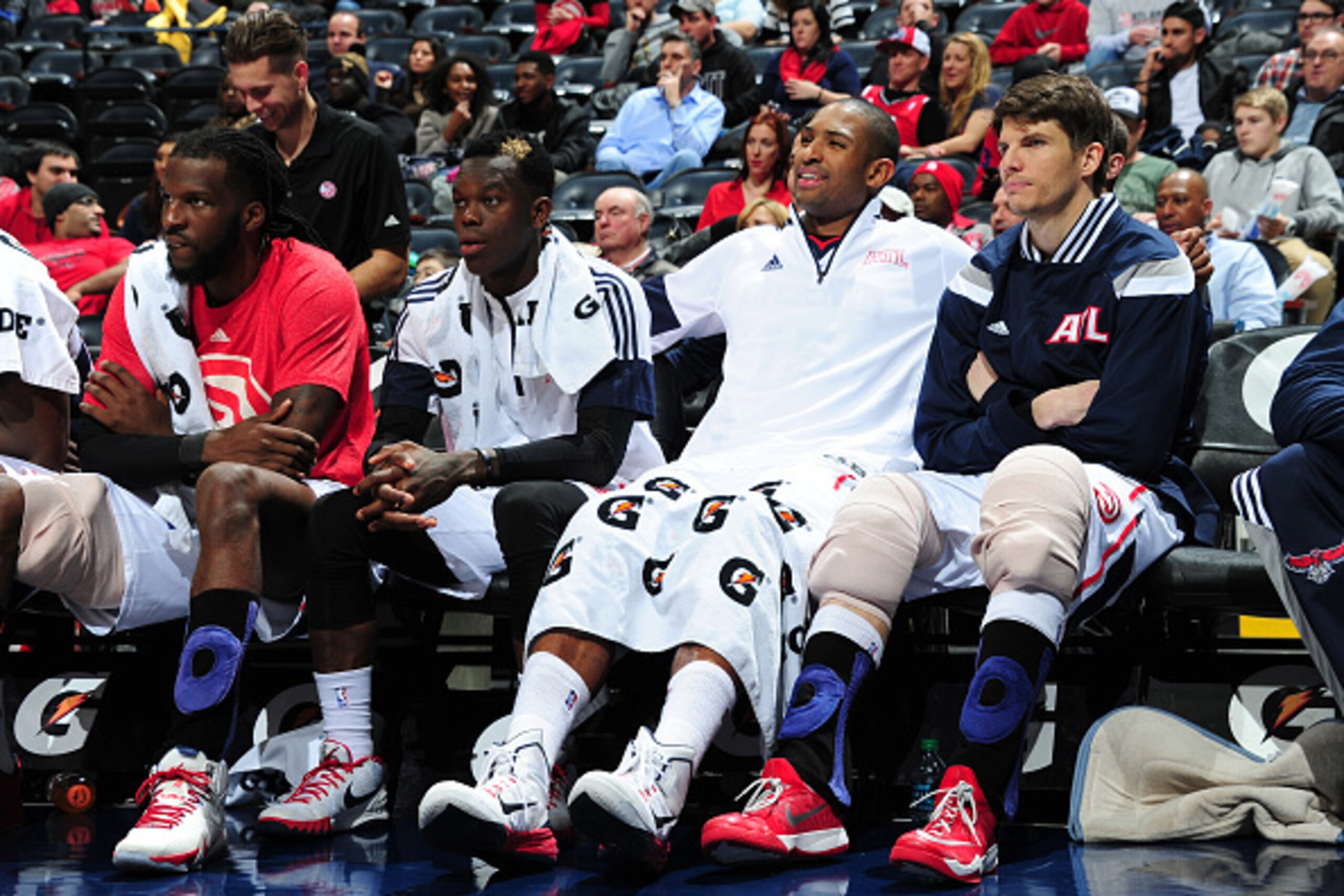ATLANTA, GA - FEBRUARY 25:  (L-R) DeMarre Caroll #5, Dennis Schroder #17, Al Horford #15, and Kyle Korver #26 during the game against the Dallas Mavericks on February 25, 2015 at Philips Arena in Atlanta, Georgia.  NOTE TO USER: User expressly acknowledge