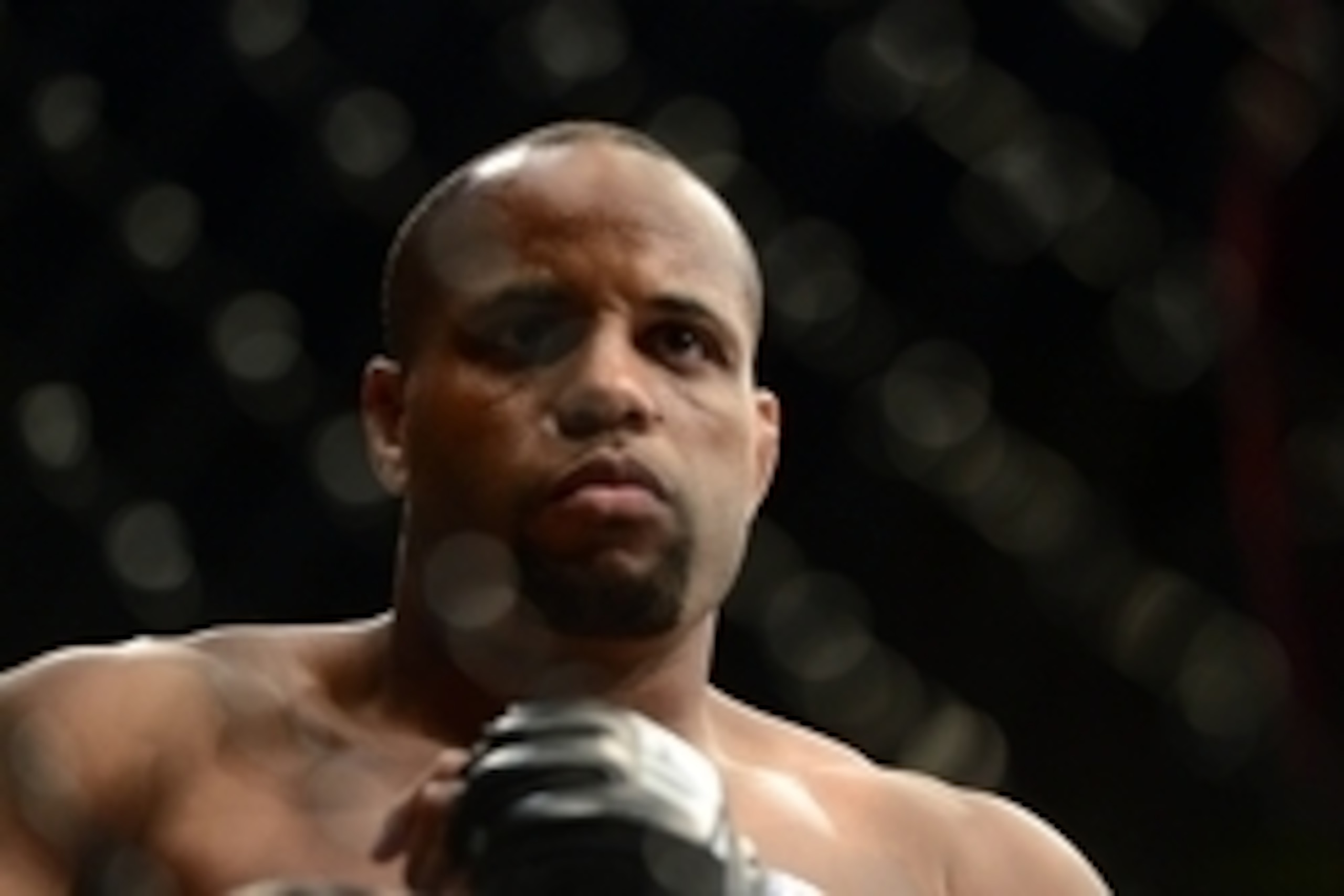 May 23, 2015; Las Vegas, NV, USA;  Daniel Cormier (blue gloves) enters the arena to fight Anthony Johnson (not pictured) for the light heavyweight championship bout during UFC 187 at MGM Grand Garden Arena. Cormier won via third round TKO. Mandatory Credi