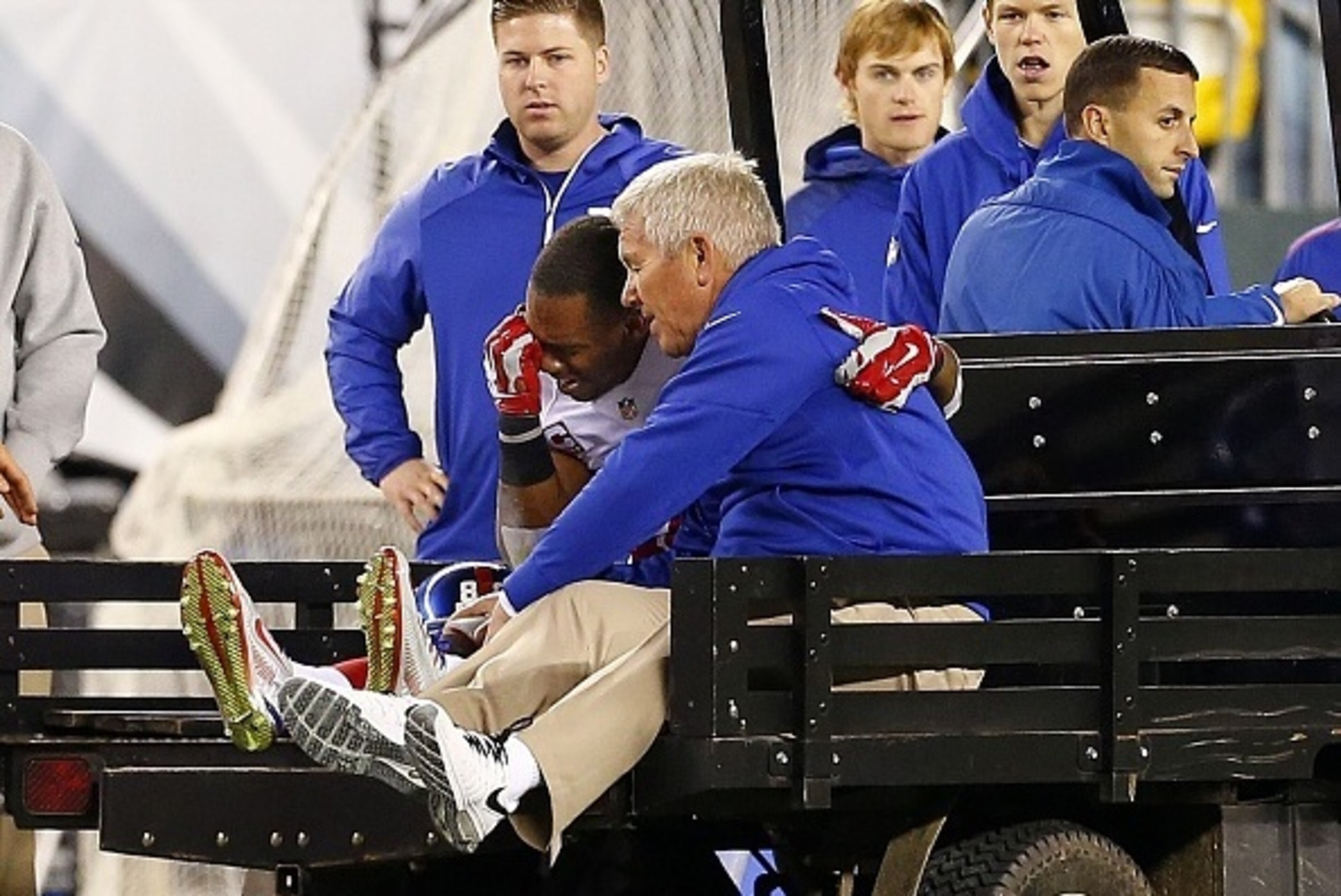 PHILADELPHIA, PA - OCTOBER 12: Victor Cruz #80 of the New York Giants is carted off the field after attempting a catch in the end zone during the third quarter of a football game at Lincoln Financial Field on October 12, 2014 in Philadelphia, Pennsylvania