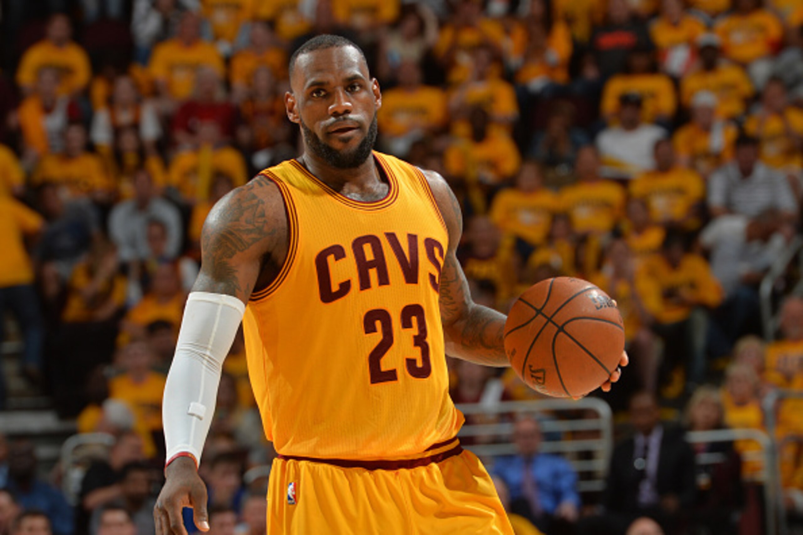 CLEVELAND,OH - MAY 26:  LeBron James #23 of the Cleveland Cavaliers dribbles the ball against the Atlanta Hawks at the Quicken Loans Arena During Game Four of the Eastern Conference Finals during the 2015 NBA Playoffs on May 26, 2015 in Cleveland,Ohio NOT