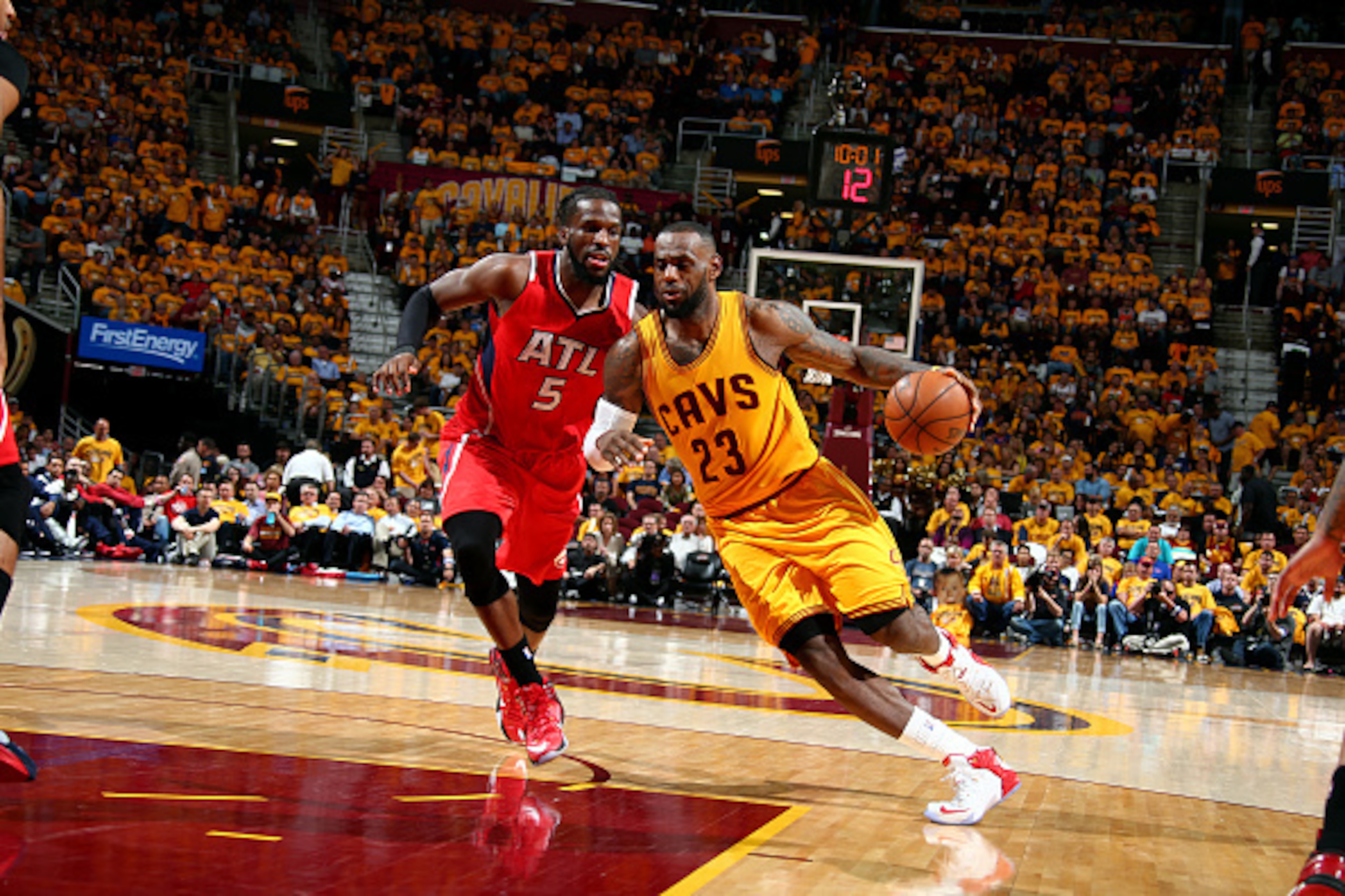 CLEVELAND, OH - MAY 26: LeBron James #23 of the Cleveland Cavaliers drives against DeMarre Carroll #5 of the Atlanta Hawks in Game Four of the Eastern Conference Finals during the 2015 NBA Playoffs on May 26, 2015 at Quicken Loans Arena in Cleveland, Ohio