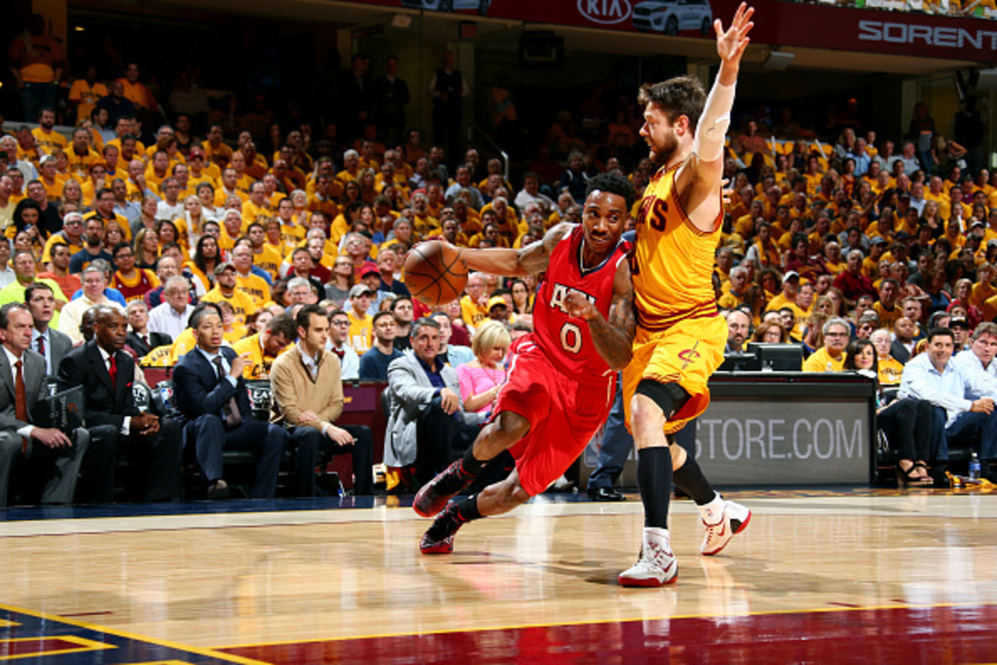 CLEVELAND, OH - MAY 26: Jeff Teague #0 of the Atlanta Hawks drives against Matthew Dellavedova #8 of the Cleveland Cavaliers in Game Four of the Eastern Conference Finals during the 2015 NBA Playoffs on May 26, 2015 at Quicken Loans Arena in Cleveland, Oh