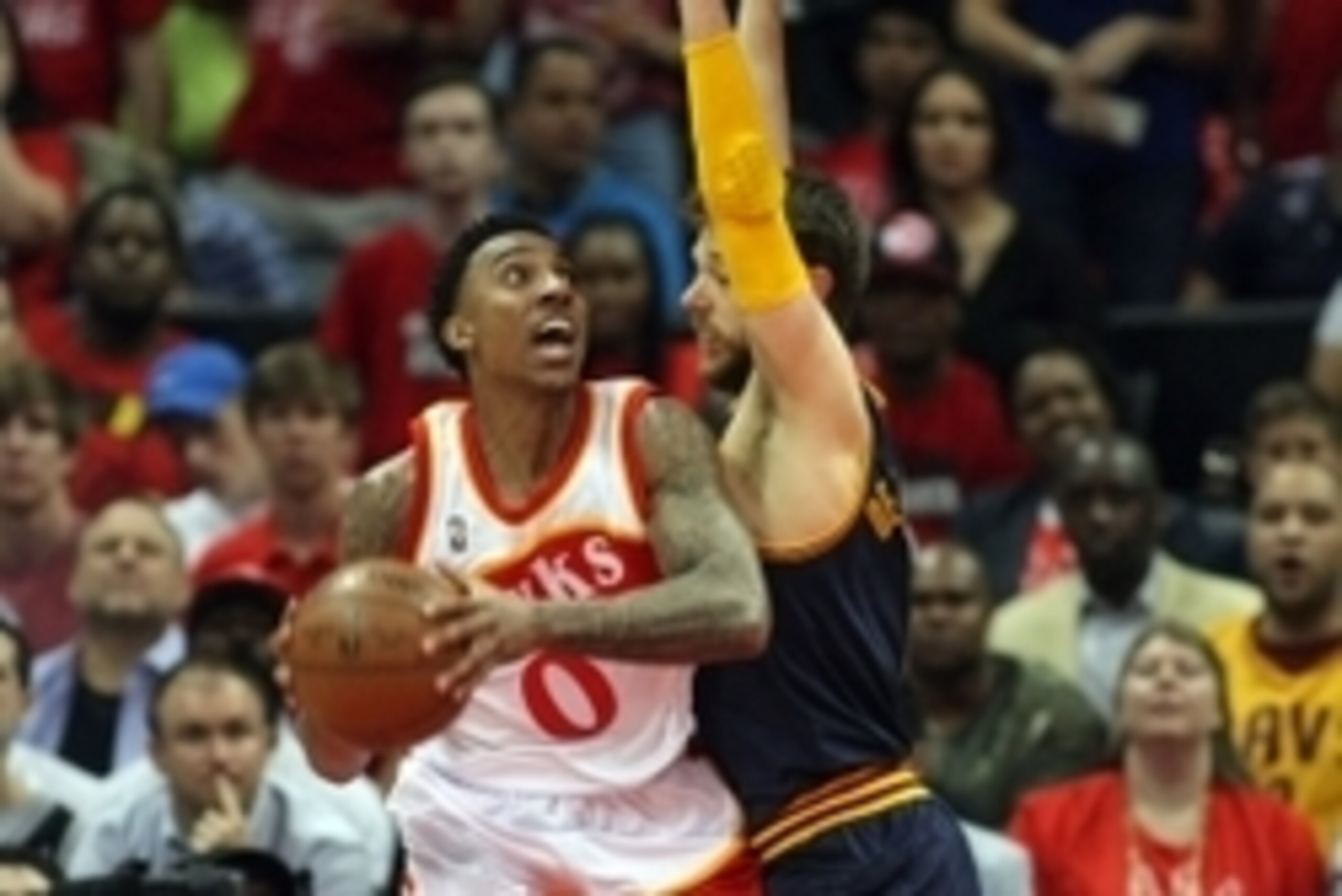 May 22, 2015; Atlanta, GA, USA; Atlanta Hawks guard Jeff Teague (0) looks to the basket against Cleveland Cavaliers guard Matthew Dellavedova (8) during the first quarter in game two of the Eastern Conference Finals of the NBA Playoffs at Philips Arena. M