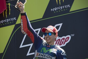 LE MANS, FRANCE - MAY 17:  Jorge Lorenzo of Spain and Movistar Yamaha MotoGP celebrates the victory on the podium at the end of the MotoGP race during the MotoGp of France - Race at  on May 17, 2015 in Le Mans, France.  (Photo by Mirco Lazzari gp/Getty Im