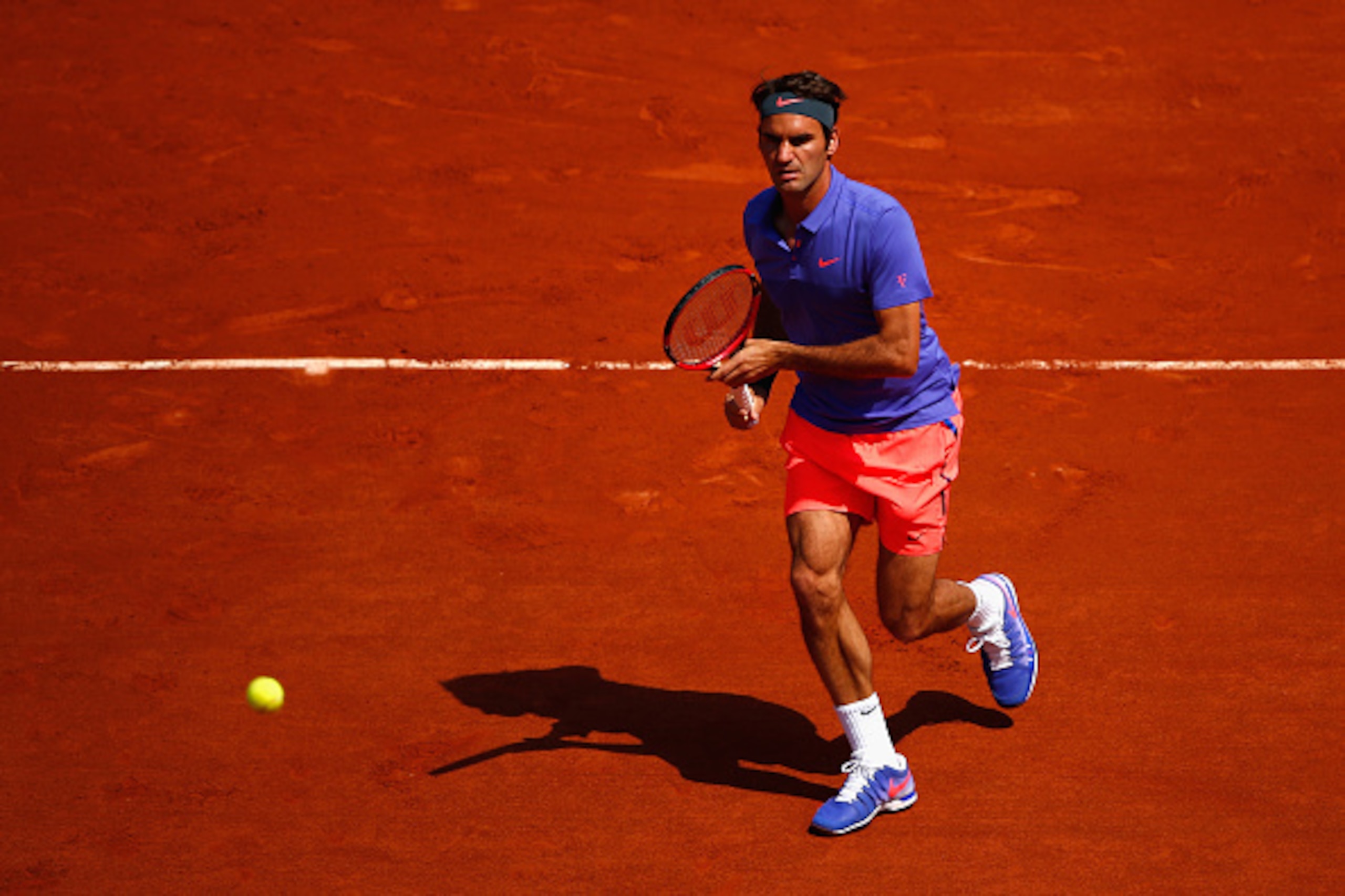 PARIS, FRANCE - MAY 24:  Roger Federer of Switzerland plays a forehand during his Men's Singles match against Alejandro Falla of Colombia on day one of the 2015 French Open at Roland Garros on May 24, 2015 in Paris, France.  (Photo by Julian Finney/Getty 