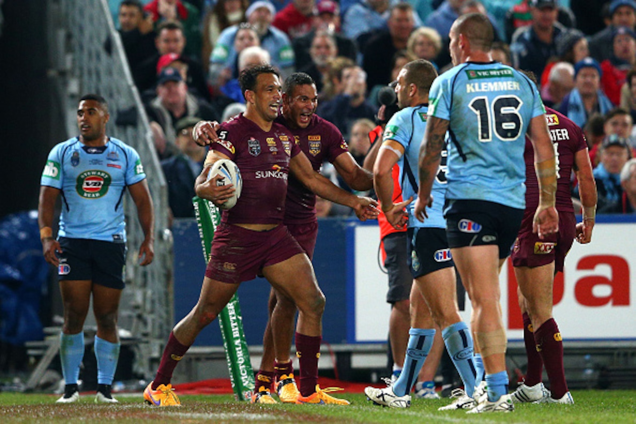SYDNEY, AUSTRALIA - MAY 27:  Will Chambers of the Maroons celebrates scoring a try during game one of the State of Origin series between the New South Wales Blues and the Queensland Maroons at ANZ Stadium on May 27, 2015 in Sydney, Australia.  (Photo by C