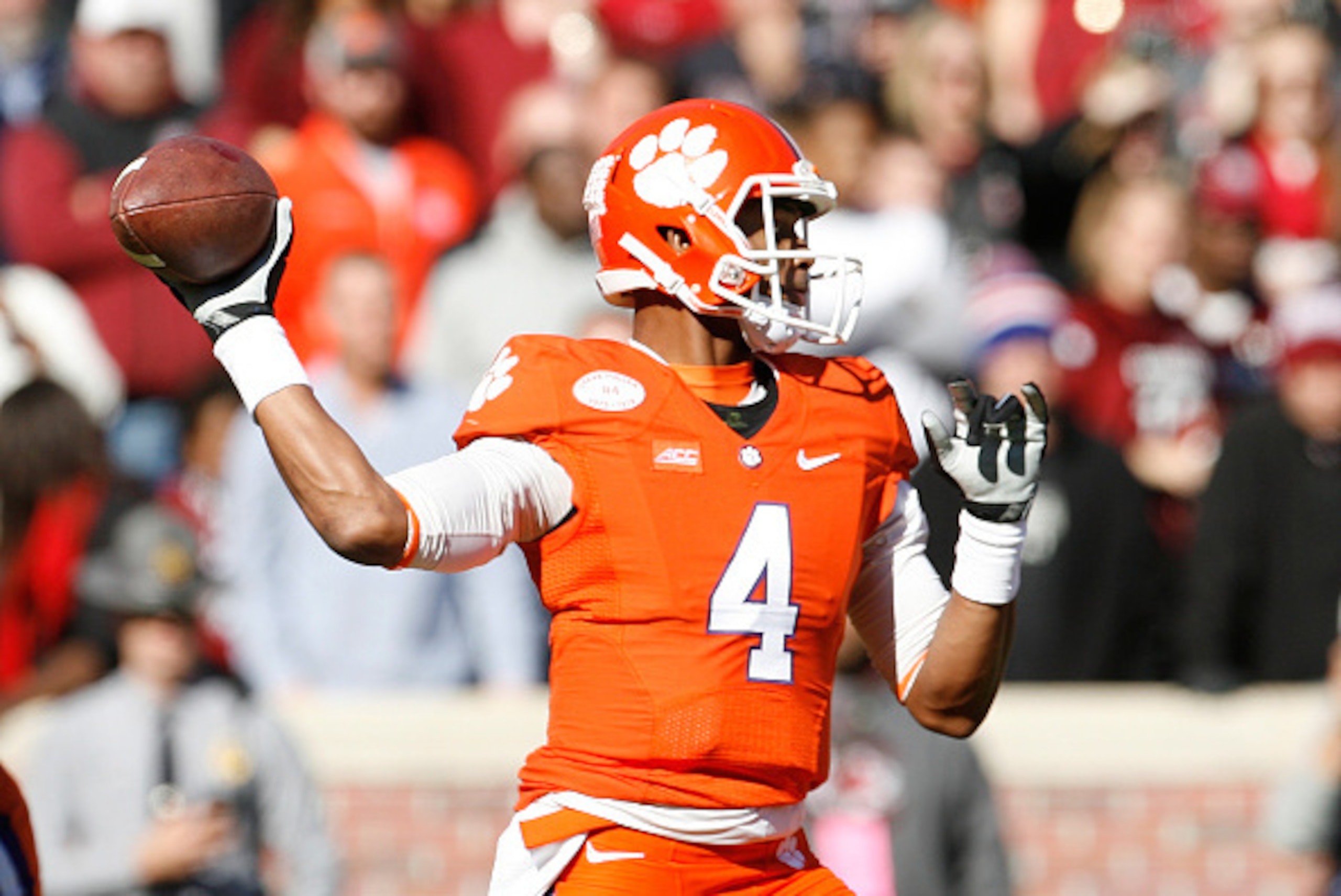 CLEMSON, SC - NOVEMBER 29: Deshaun Watson #4 of the Clemson Tigers drops back to pass during their game against the South Carolina Gamecocks at Memorial Stadium on November 29, 2014 in Clemson, South Carolina. (Photo by Tyler Smith/Getty Images)