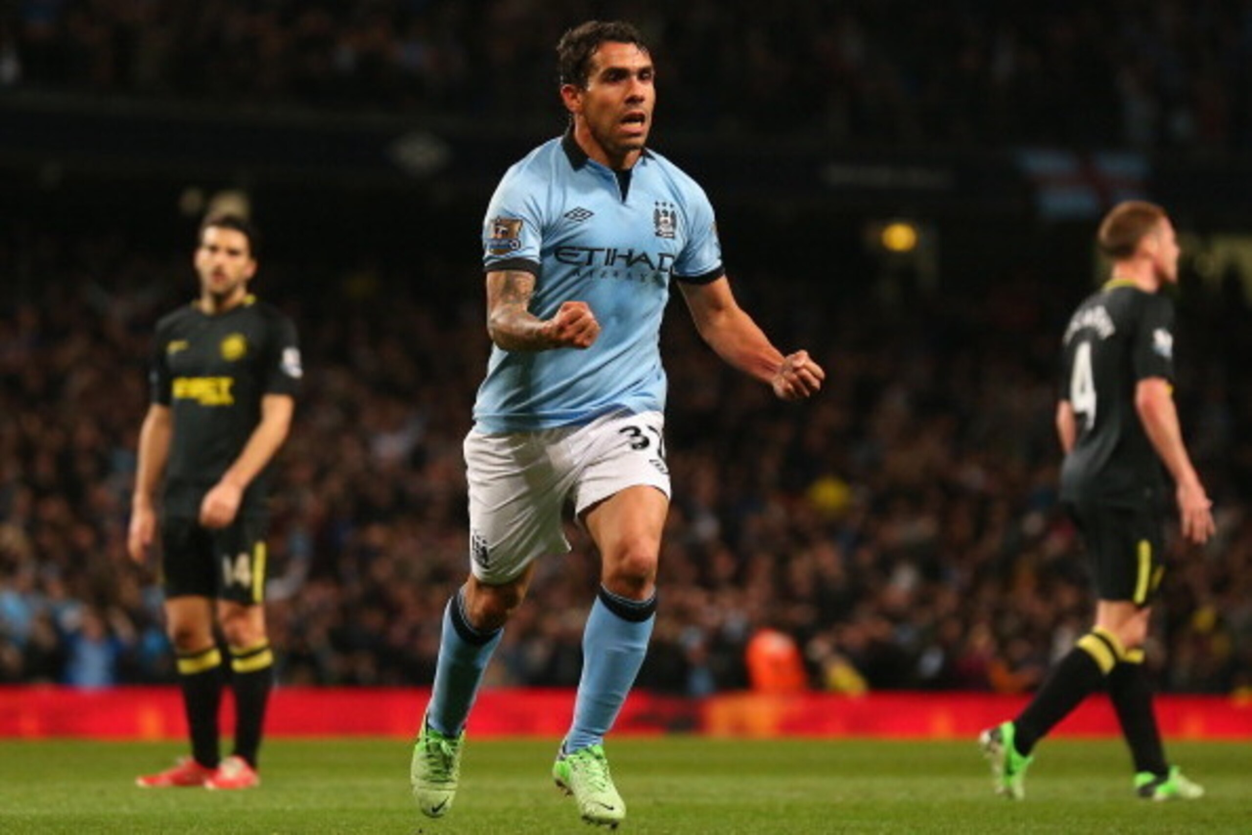 MANCHESTER, ENGLAND - APRIL 17: Carlos Tevez of Manchester City celebrates scoring the opening goal during the Barclays Premier League match between Manchester City and Wigan Athletic at the Etihad Stadium on April 17, 2013 in Manchester, England. (Phot MANCHESTER, ENGLAND - APRIL 17: Carlos Tevez of Manchester City celebrates scoring the opening goal during the Barclays Premier League match between Manchester City and Wigan Athletic at the Etihad Stadium on April 17, 2013 in Manchester, England. (Phot