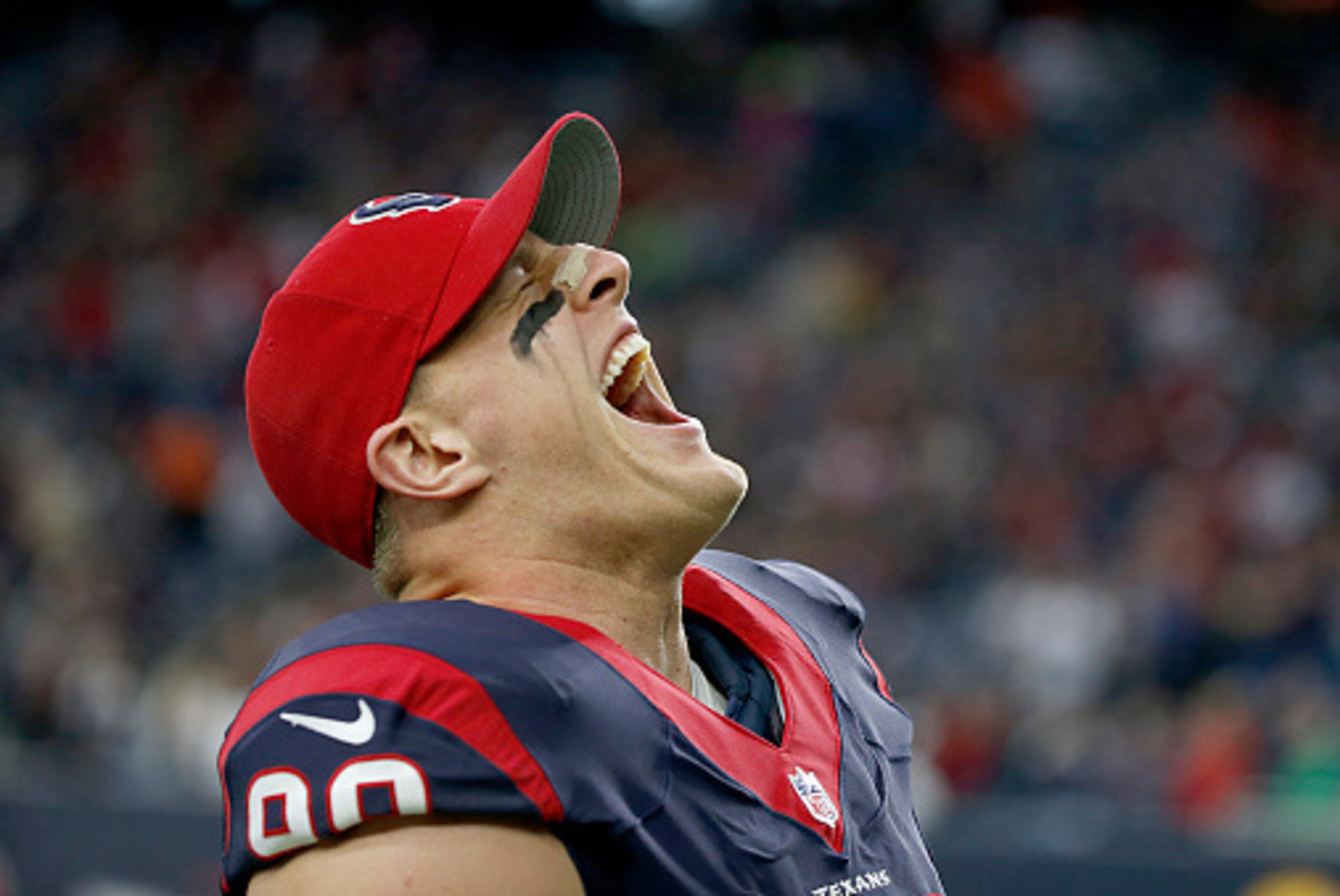HOUSTON, TX - DECEMBER 28: J.J. Watt #99 of the Houston Texans screams before playing the Jacksonville Jaguars in a NFL game on December 28, 2014 at NRG Stadium in Houston, Texas. (Photo by Scott Halleran/Getty Images)