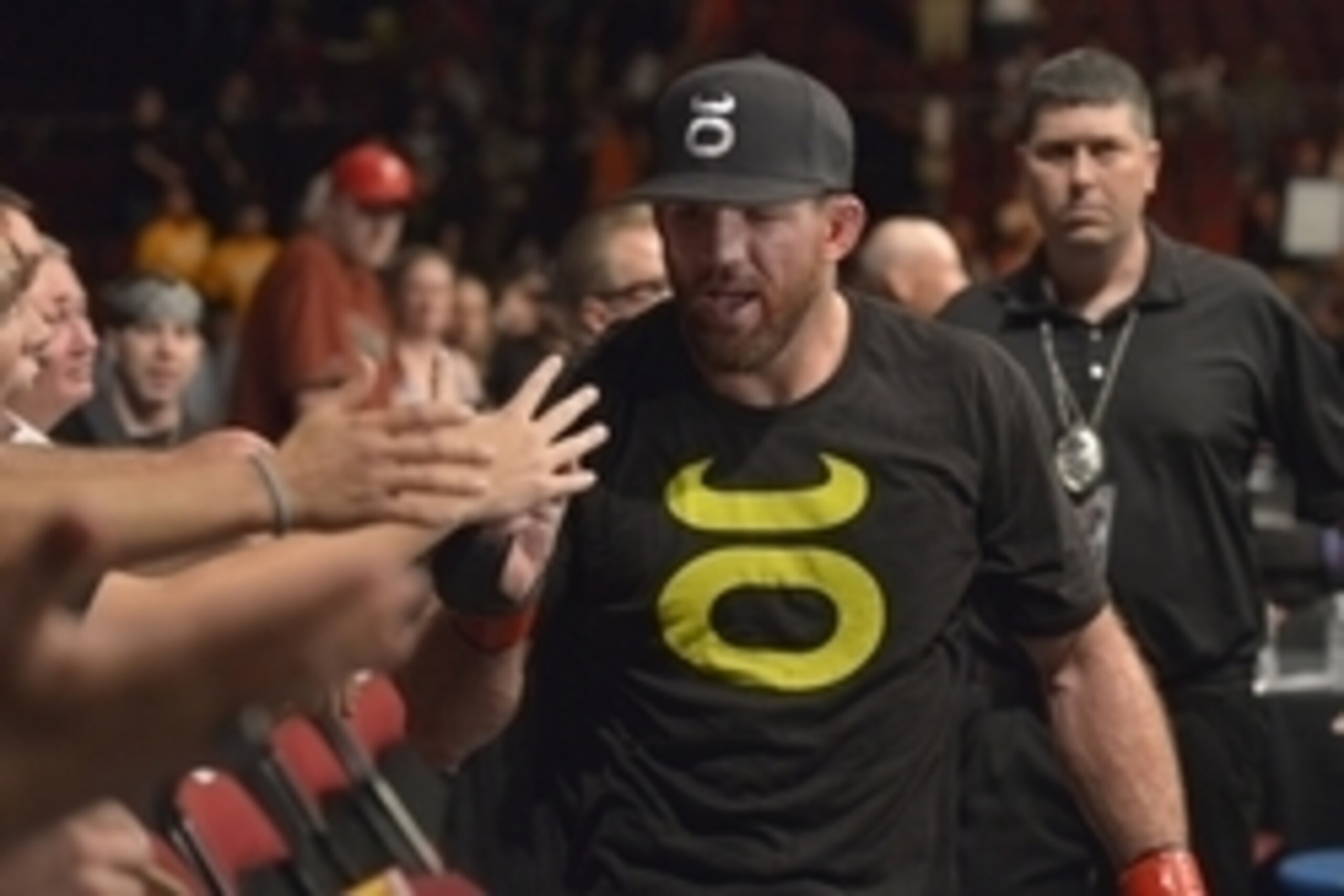 Aug 16, 2014; Bangor, ME, USA; Ryan Bader (red gloves) leaves the octagon after defeating Ovince Saint Preux (blue gloves not pictured) during light heavyweight bout at Cross Insurance Center. Mandatory Credit: Gregory J. Fisher-USA TODAY Sports