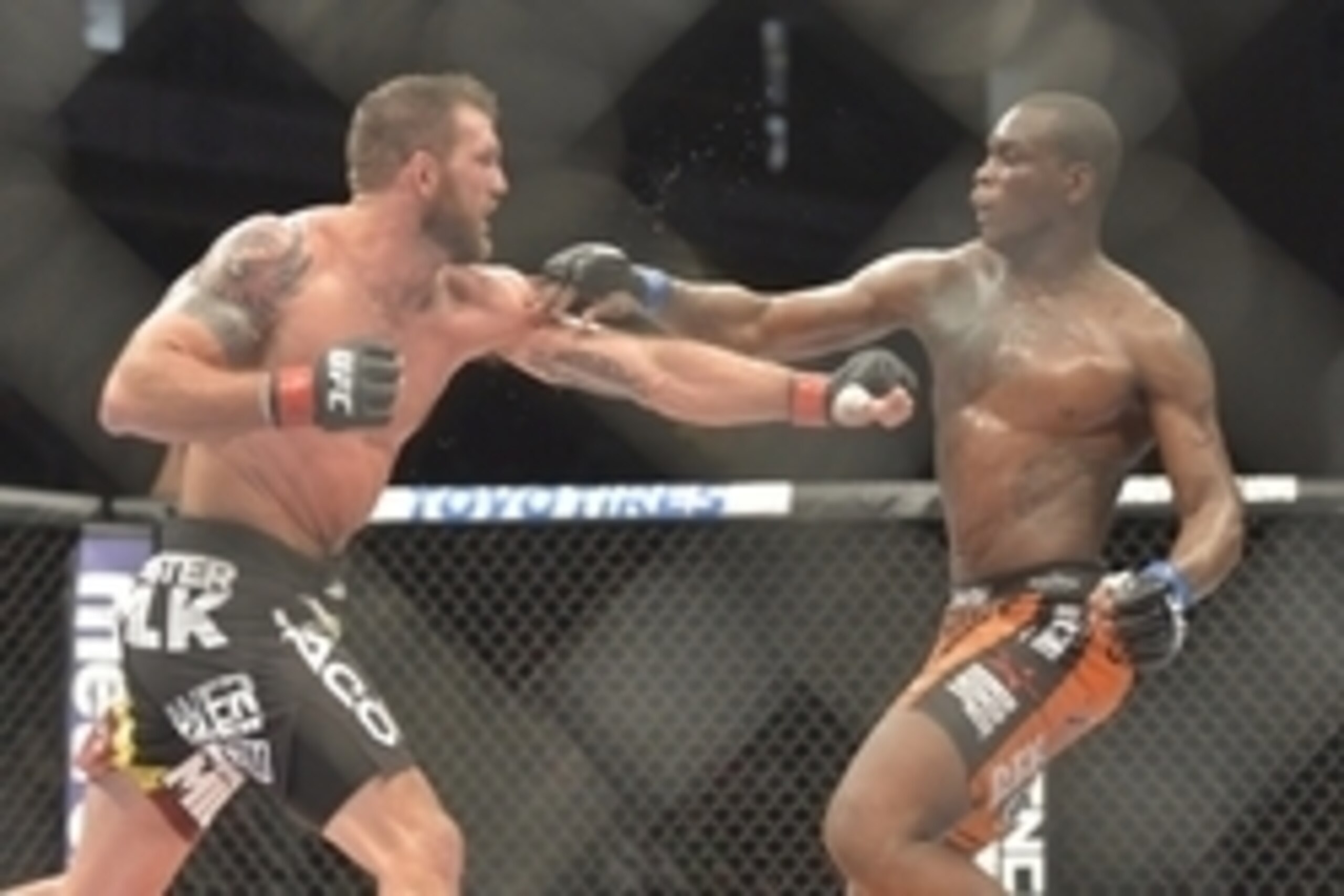 Aug 16, 2014; Bangor, ME, USA; Ryan Bader (red gloves) fights Ovince Saint Preux (blue gloves) during light heavyweight bout at Cross Insurance Center. Mandatory Credit: Gregory J. Fisher-USA TODAY Sports