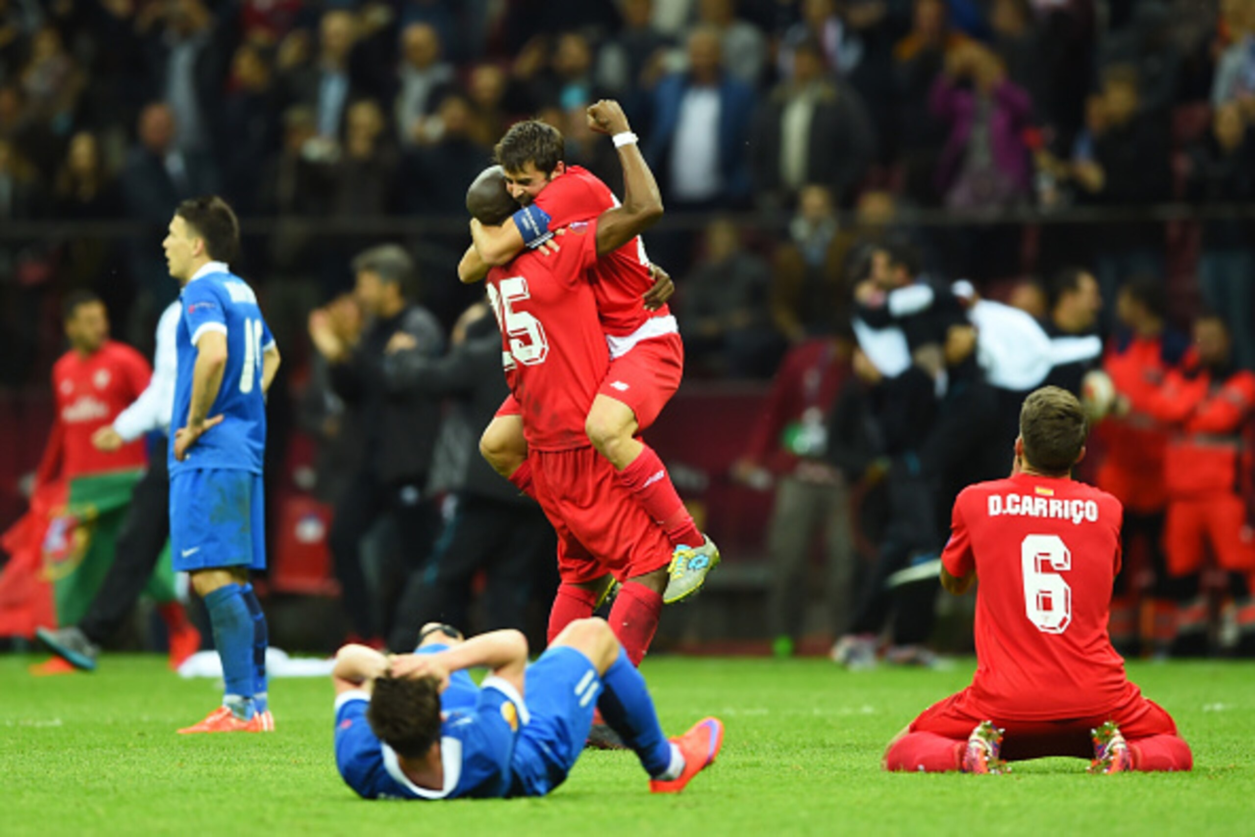 WARSAW, POLAND - MAY 27: Coke of Sevilla celebrates victory with Stephane Mbia after the UEFA Europa League Final match between FC Dnipro Dnipropetrovsk and FC Sevilla on May 27, 2015 in Warsaw, Poland. (Photo by Shaun Botterill/Getty Images) WARSAW, POLAND - MAY 27: Coke of Sevilla celebrates victory with Stephane Mbia after the UEFA Europa League Final match between FC Dnipro Dnipropetrovsk and FC Sevilla on May 27, 2015 in Warsaw, Poland. (Photo by Shaun Botterill/Getty Images)