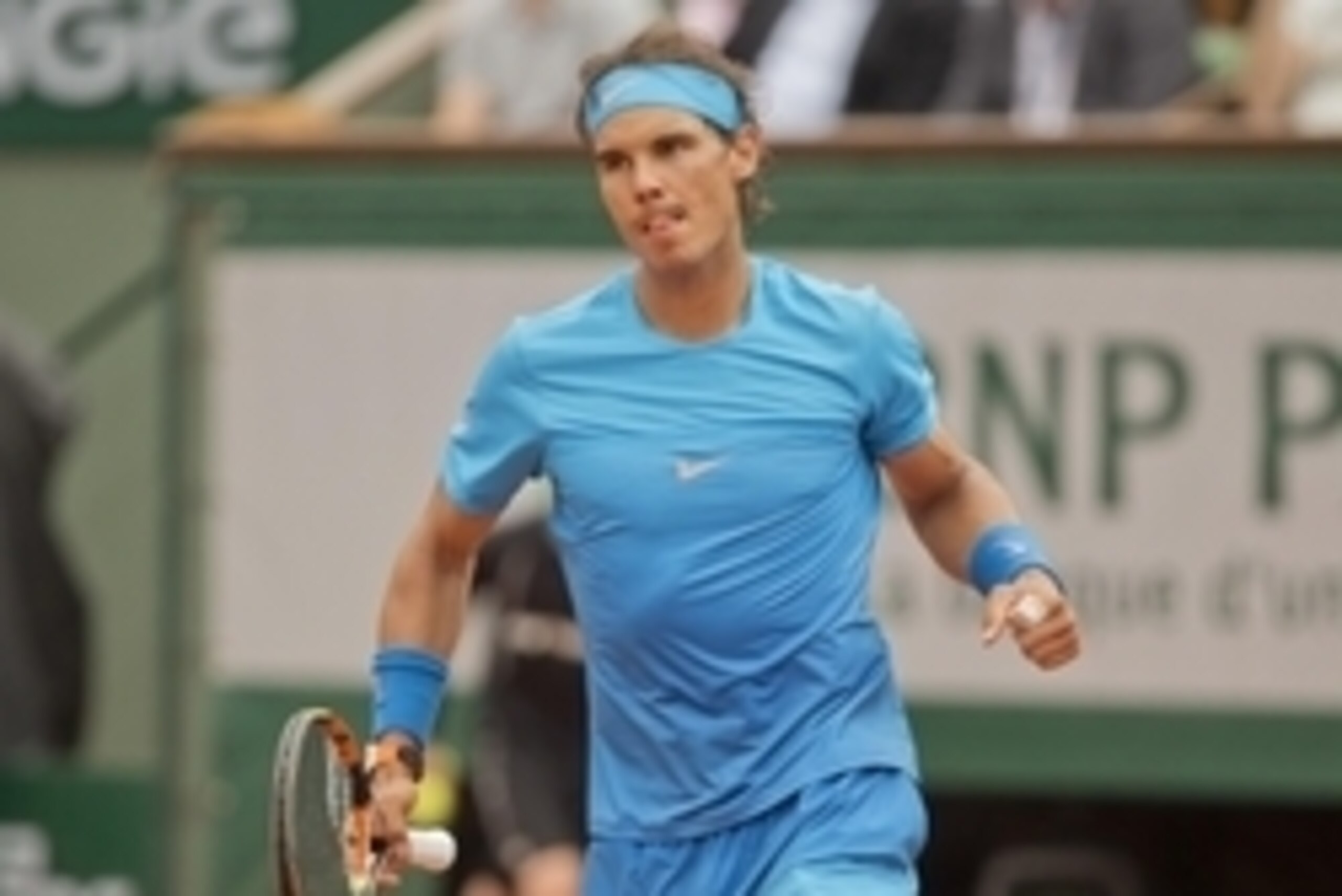 May 26, 2015; Paris, France;  Rafael Nadal (ESP) celebrates recording match point during his match against Quentin Halys (FRA) on day three at Roland Garros. Mandatory Credit: Susan Mullane-USA TODAY Sports