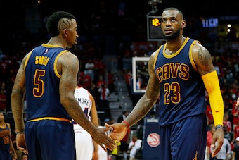 ATLANTA, GA - MAY 20:  LeBron James #23 and J.R. Smith #5 of the Cleveland Cavaliers react after Iman Shumpert #4 drew a foul in the second half against the Atlanta Hawks during Game One of the Eastern Conference Finals of the 2015 NBA Playoffs at Philips