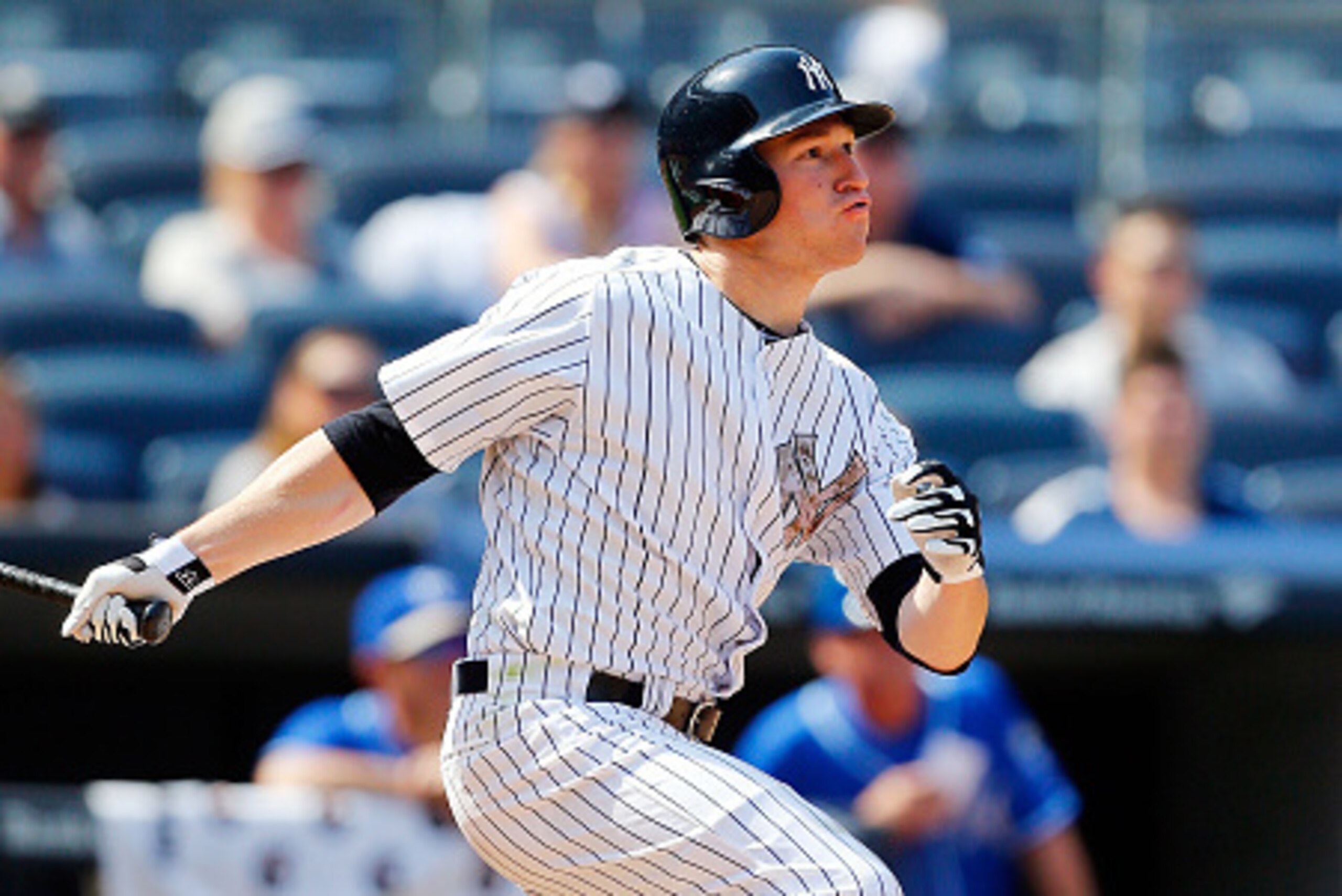 NEW YORK, NY - MAY 25:  Slade Heathcott #55 of the New York Yankees follows through on a seventh inning two run home run against the Kansas City Royals at Yankee Stadium on May 25, 2015 in the Bronx borough of New York City. The home run was the first in 