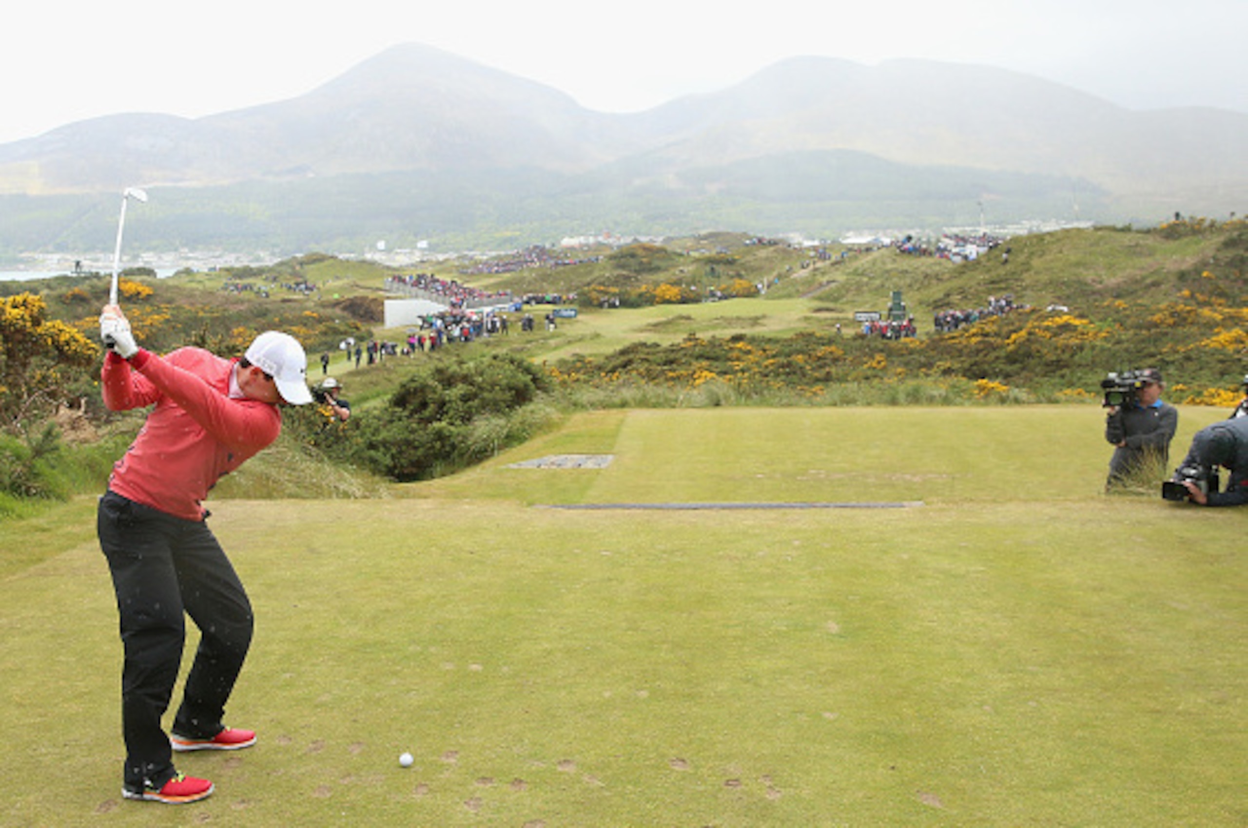 NEWCASTLE, NORTHERN IRELAND - MAY 28: Rory McIlroy of Northern Ireland tees off on the 4th hole during the First Round of the Dubai Duty Free Irish Open Hosted by the Rory Foundation at Royal County Down Golf Club on May 28, 2015 in Newcastle, Northern Ir