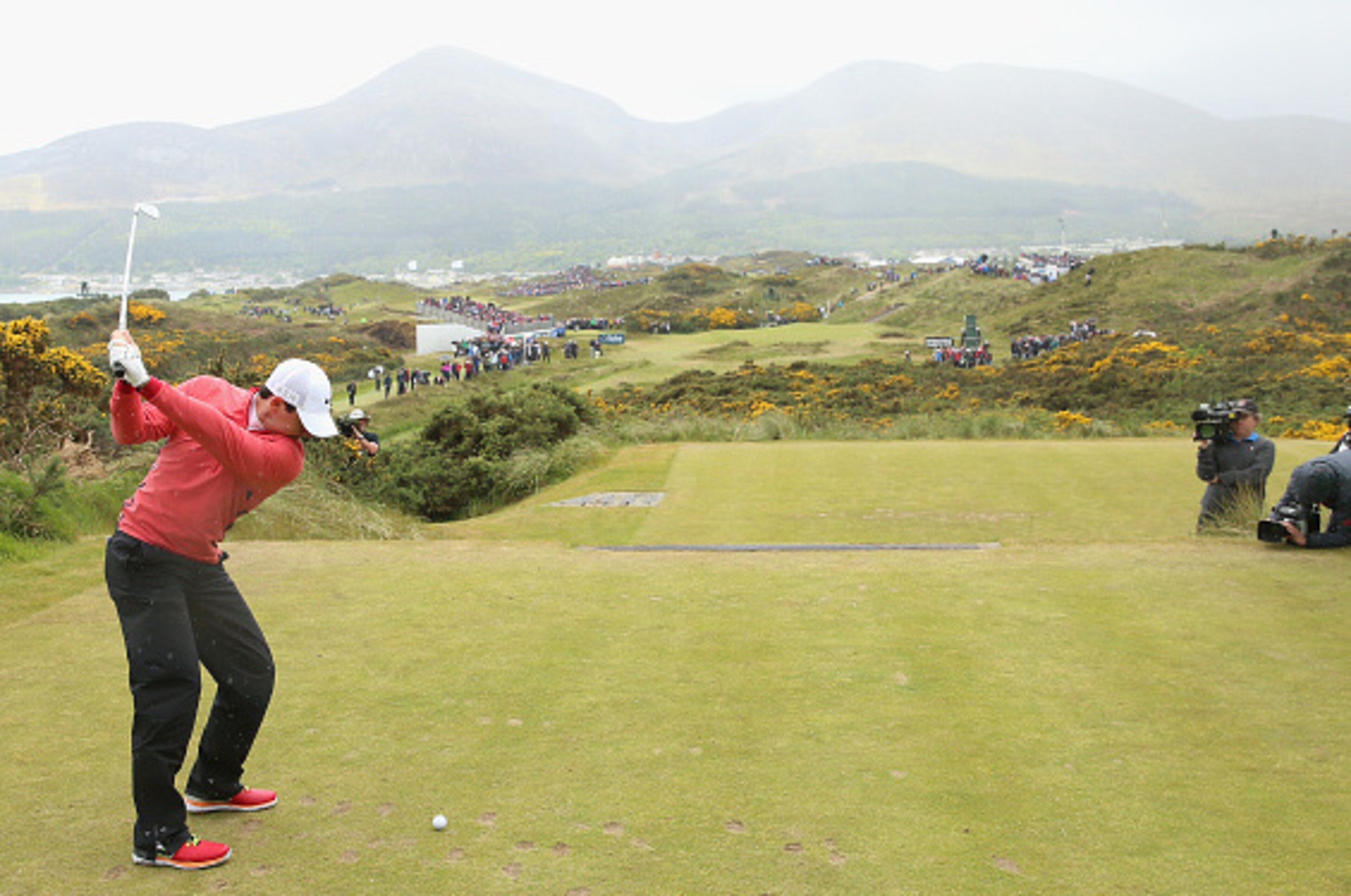 NEWCASTLE, NORTHERN IRELAND - MAY 28: Rory McIlroy of Northern Ireland tees off on the 4th hole during the First Round of the Dubai Duty Free Irish Open Hosted by the Rory Foundation at Royal County Down Golf Club on May 28, 2015 in Newcastle, Northern Ir