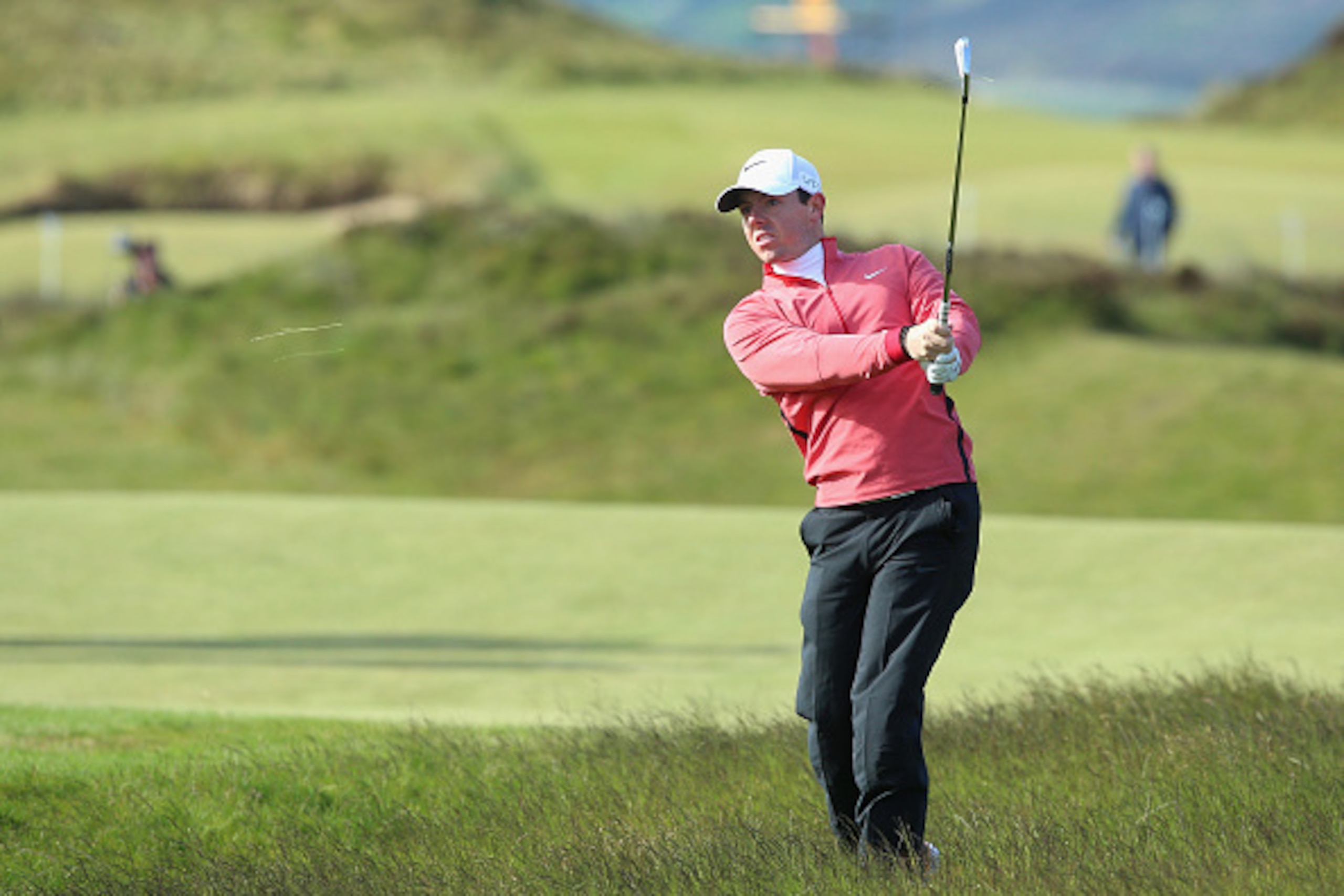 NEWCASTLE, NORTHERN IRELAND - MAY 28:  Rory McIlroy of Northern Ireland hits his 2nd shot on the 12th hole during the First Round of the Dubai Duty Free Irish Open Hosted by the Rory Foundation at Royal County Down Golf Club on May 28, 2015 in Newcastle, 