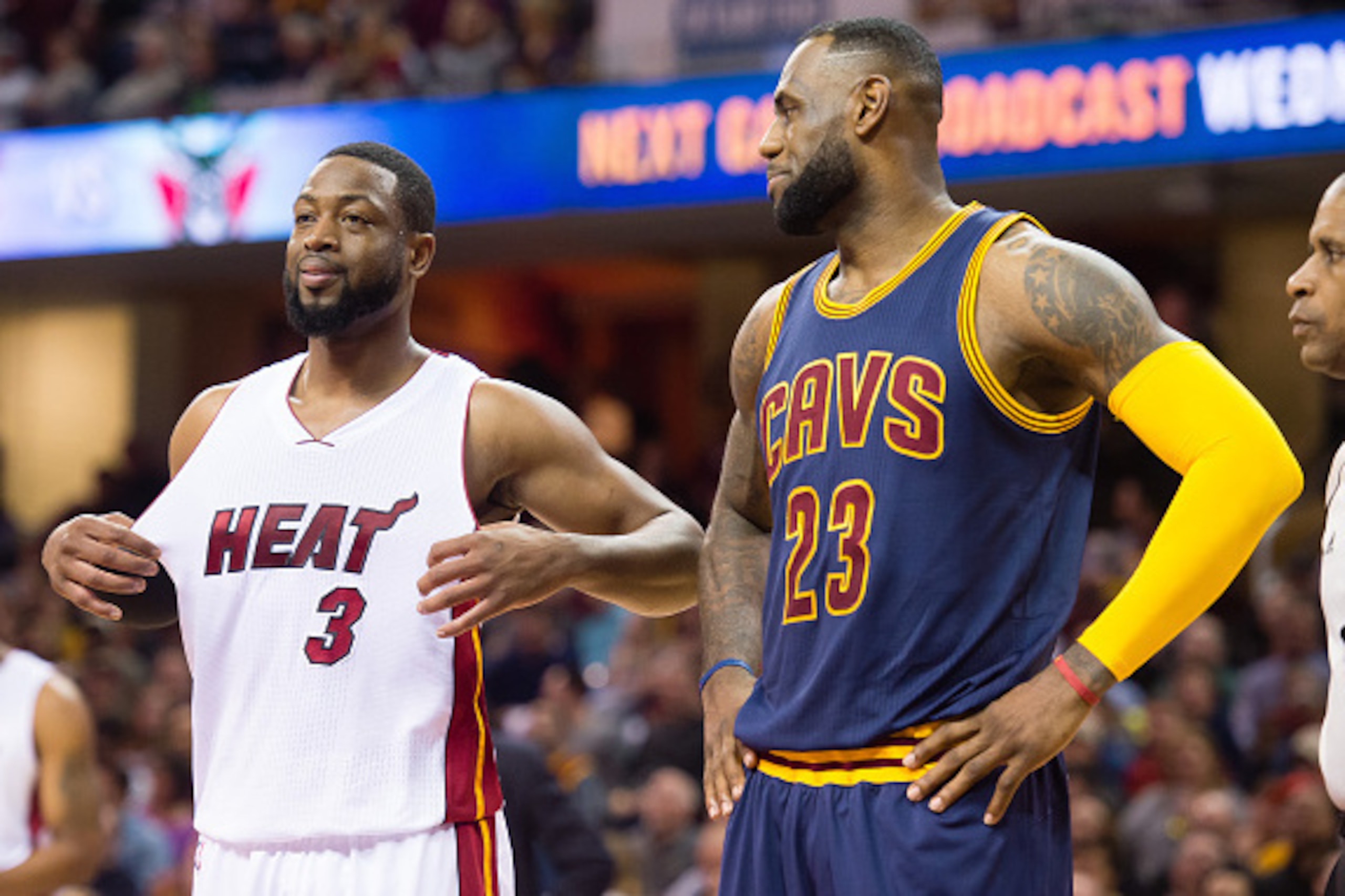 CLEVELAND, OH - APRIL 2:  Dwyane Wade #3 of the Miami Heat talks with LeBron James #23 of the Cleveland Cavaliers during the first half at Quicken Loans Arena on April 2, 2015 in Cleveland, Ohio. NOTE TO USER: User expressly acknowledges and agrees that, 
