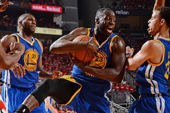 HOUSTON, TX - MAY 23:  Draymond Green #23 of the Golden State Warriors grabs the rebound against the Houston Rockets in Game Three of the Western Conference Finals during the 2015 NBA Playoffs on May 23, 2015 at the Toyota Center in Houston, Texas. NOTE T