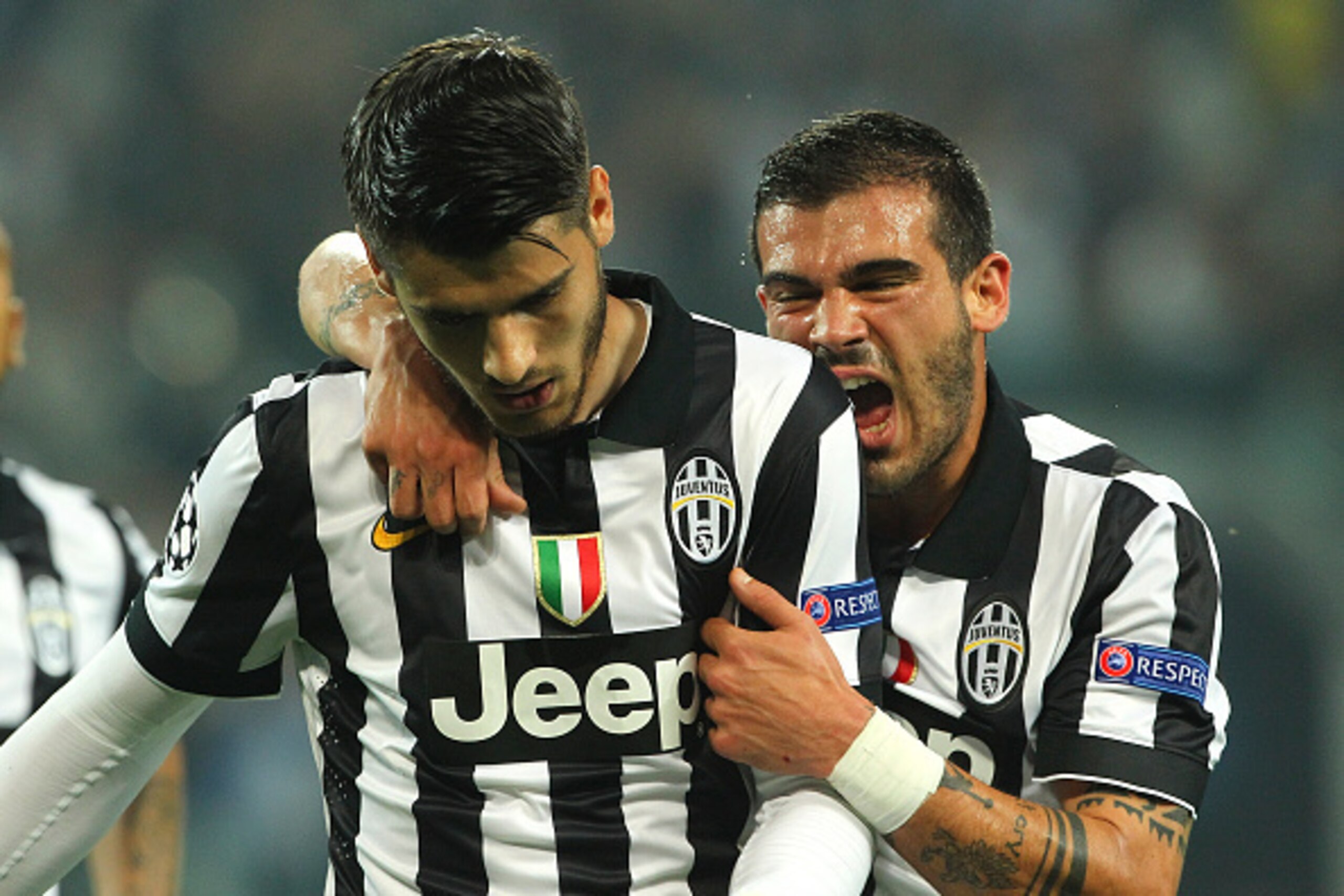 TURIN, ITALY - MAY 05:  Alvaro Morata of Juventus FC celebrates with his team-mate Stefano Sturaro after scoring the opening goal during the UEFA Champions League semi final match between Juventus and Real Madrid CF at Juventus Arena on May 5, 2015 in Tur