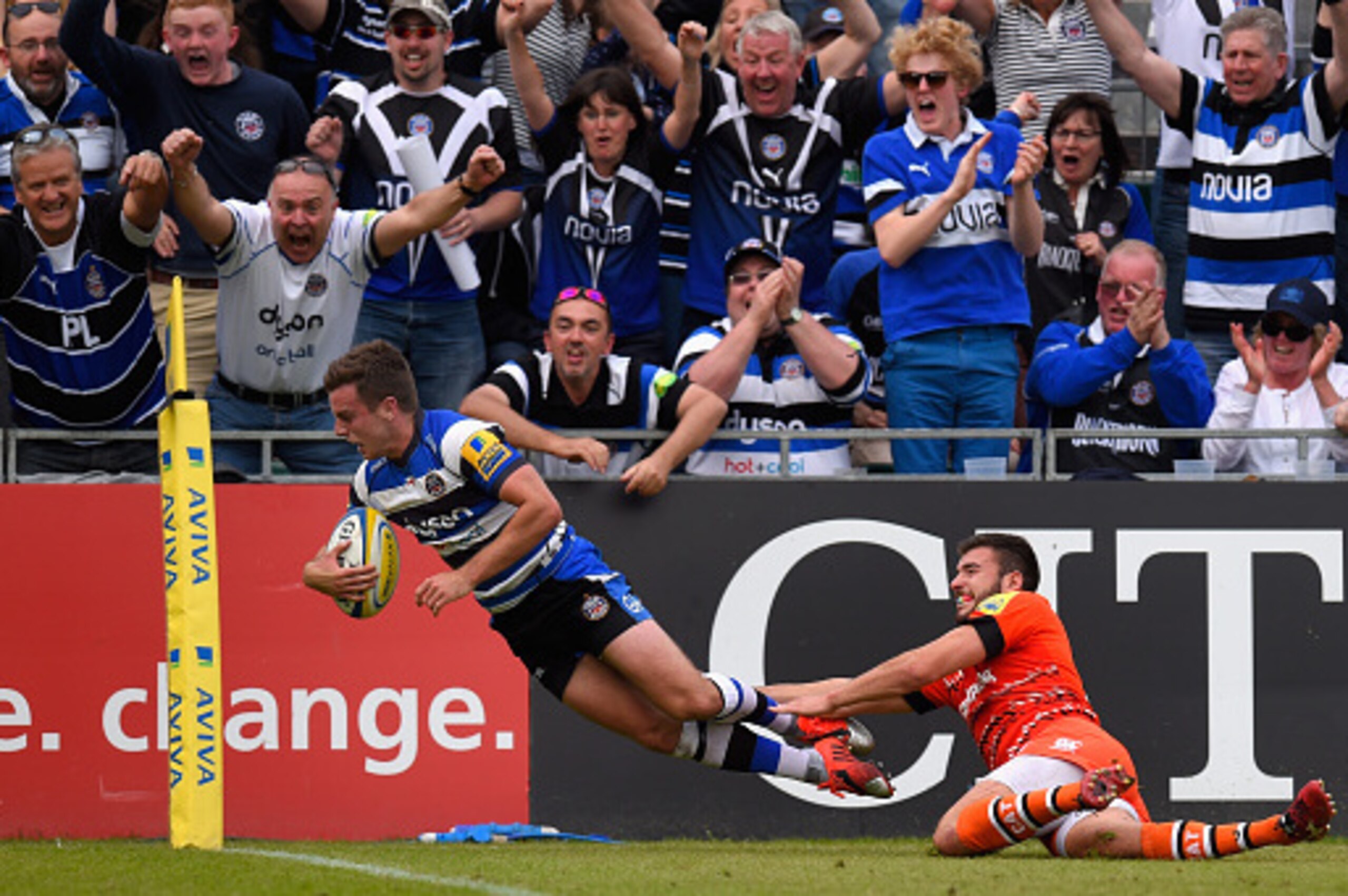 BATH, ENGLAND - MAY 23:  Bath player George Ford goes over to score despite the tackle of Tommy Bell of the Tigers during the Aviva Premiership semi final match between Bath Rugby and Leicester Tigers at Recreation Ground on May 23, 2015 in Bath, England.