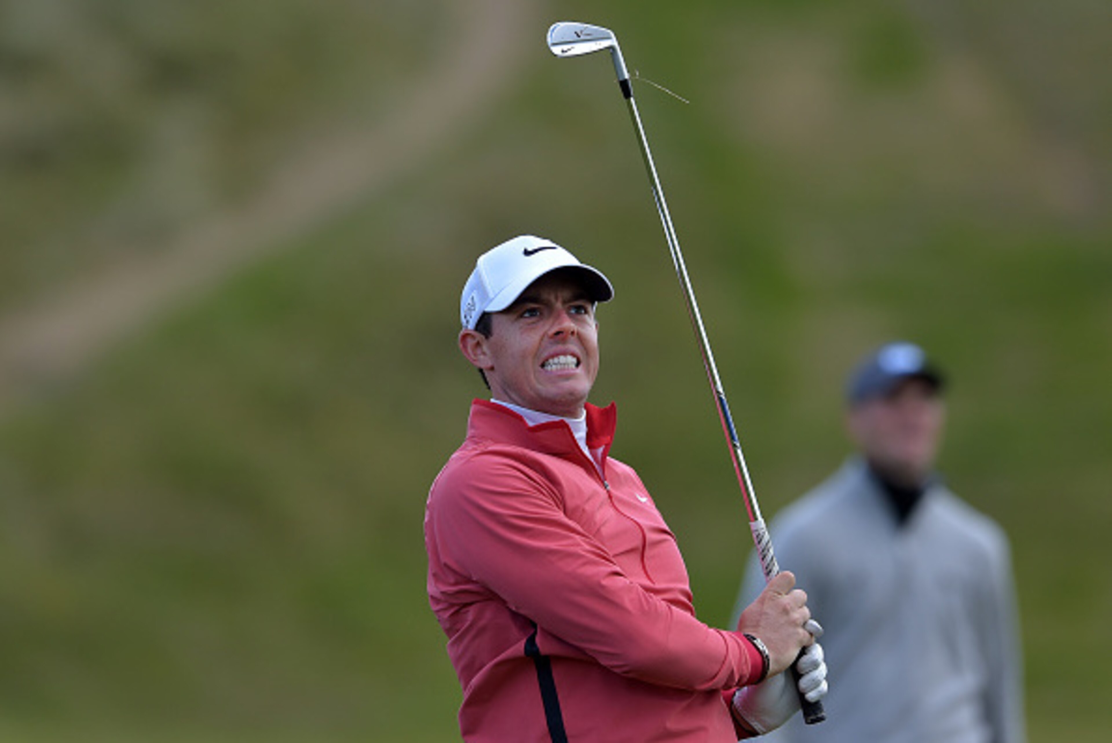 NEWCASTLE, NORTHERN IRELAND - MAY 28:  Rory McIlroy grimaces after hitting his second shot on the 9th hole during Day One of the Irish Open at Royal County Down Golf Club on May 28, 2015 in Newcastle, Northern Ireland.  (Photo by Charles McQuillan/Getty I