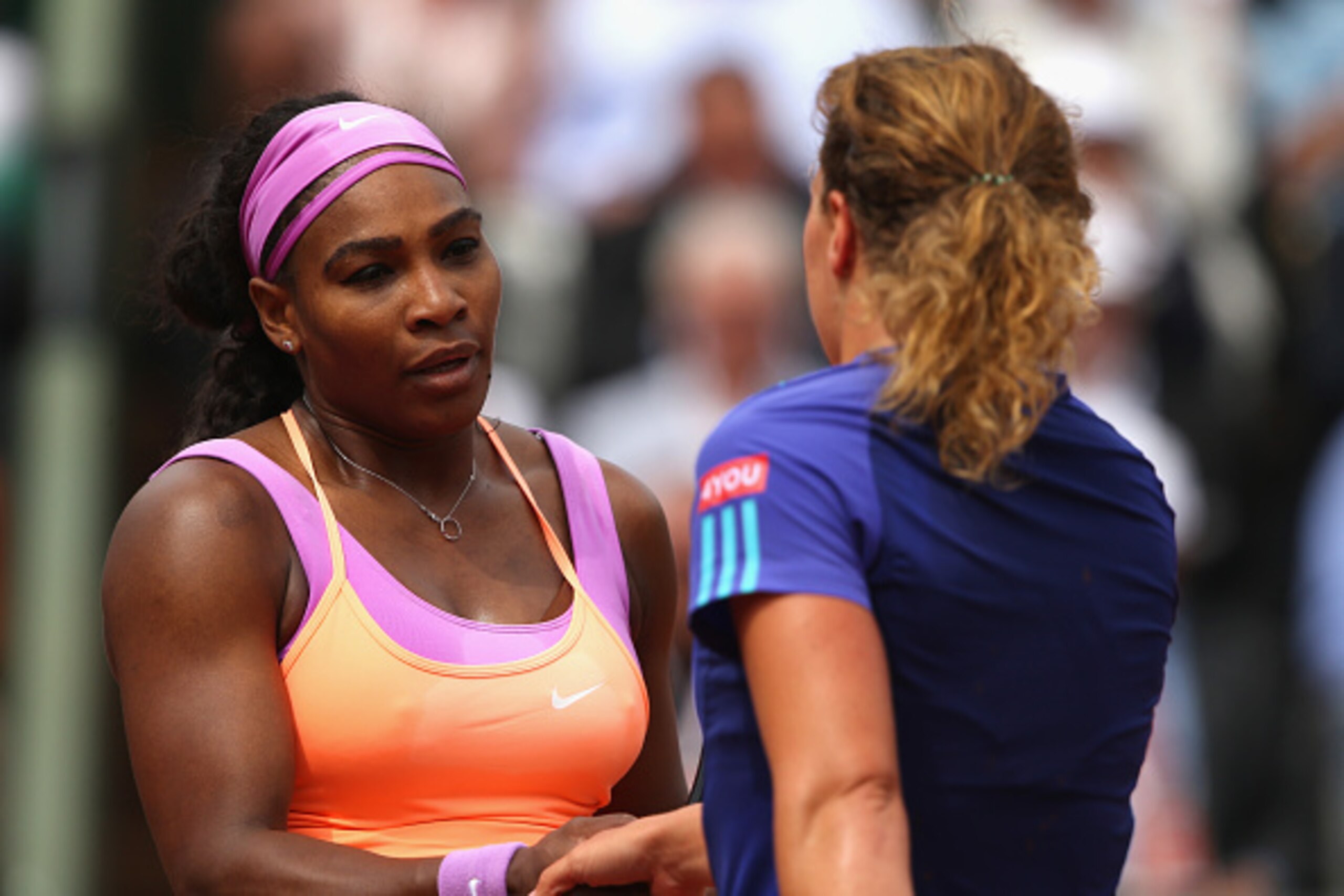 PARIS, FRANCE - MAY 28:  Anna-Lena Friedsam of Germany (R) shakes hands with Serena Williams of the United States after the Women's Singles match on day five of the 2015 French Open at Roland Garros on May 28, 2015 in Paris, France.  (Photo by Clive Bruns