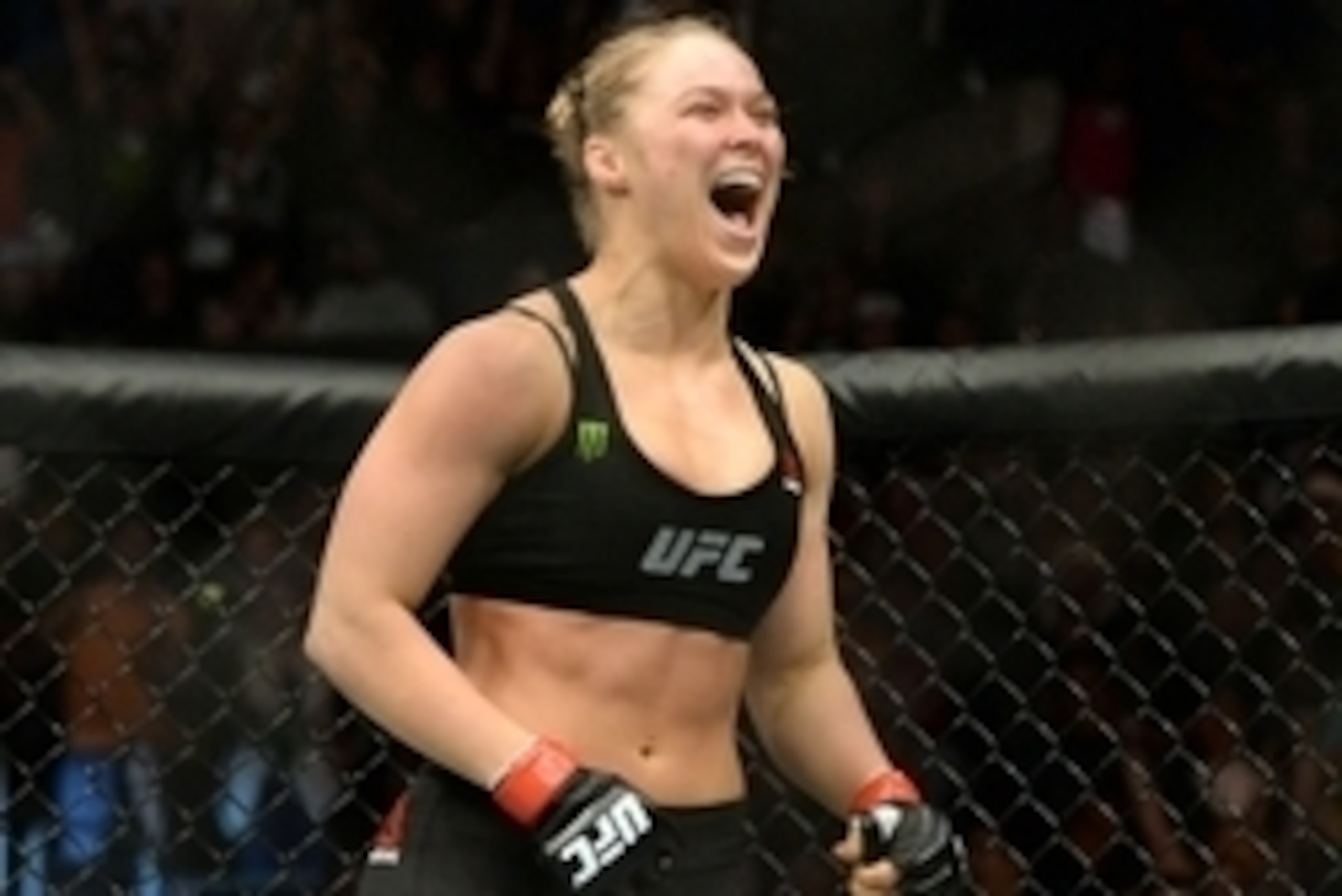 Feb 28, 2015; Los Angeles, CA, USA; Ronda Rousey (red gloves) reacts after defeating Cat Zingano (not pictured) during their women's bantamweight title bout at UFC 184 at Staples Center. Rousey won in 14 seconds of the first round. Mandatory Credit: Jayne