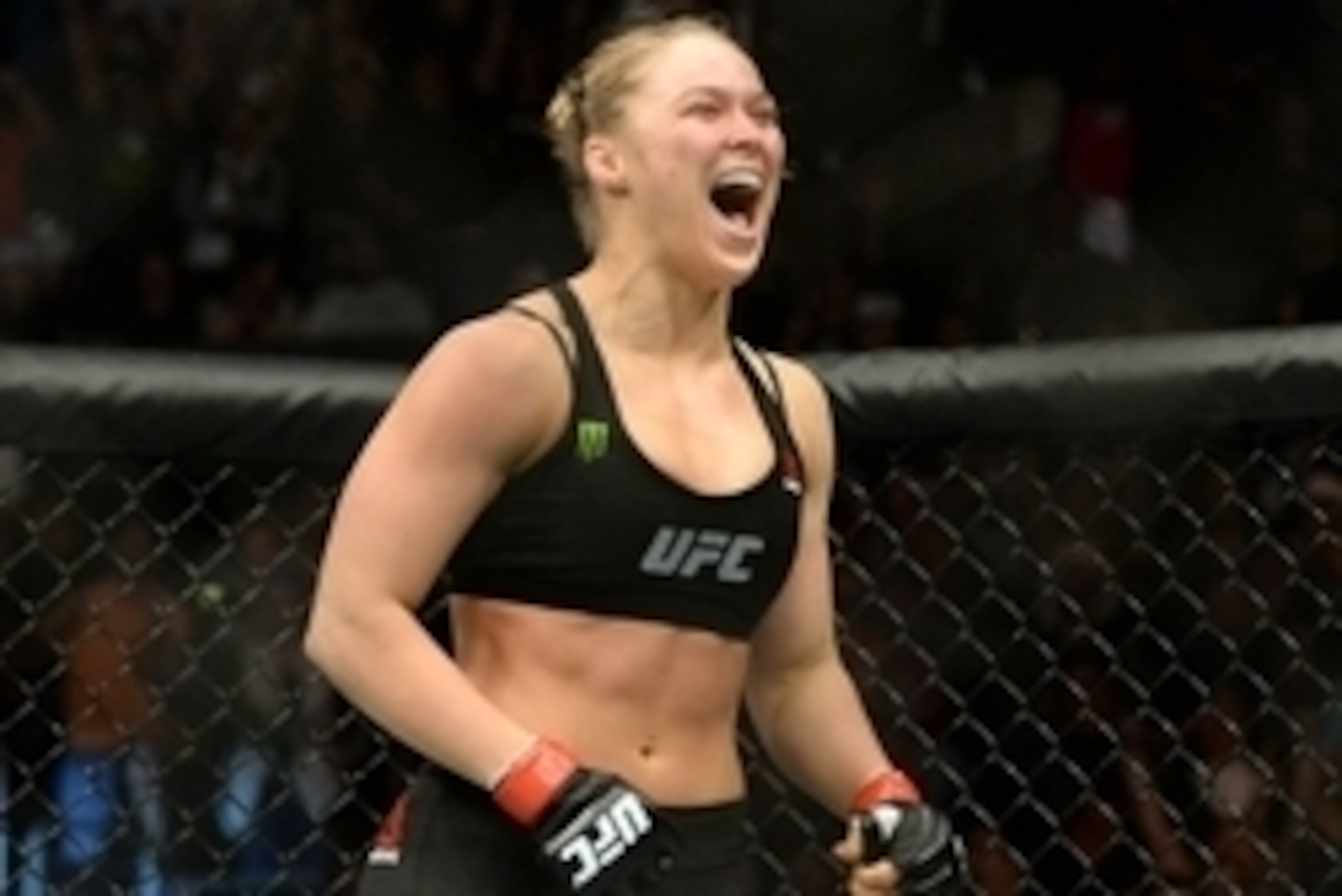 Feb 28, 2015; Los Angeles, CA, USA; Ronda Rousey (red gloves) reacts after defeating Cat Zingano (not pictured) during their women's bantamweight title bout at UFC 184 at Staples Center. Rousey won in 14 seconds of the first round. Mandatory Credit: Jayne