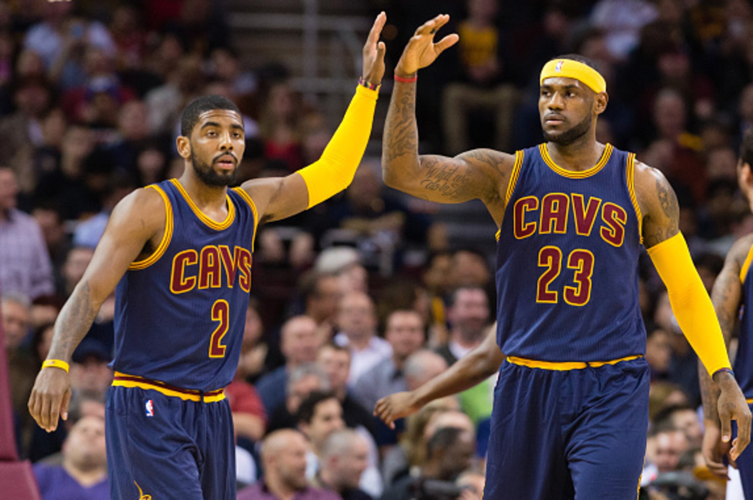 CLEVELAND, OH - FEBRUARY 26: Kyrie Irving #2 and LeBron James #23 of the Cleveland Cavaliers celebrate during the first half against the Golden State Warriors at Quicken Loans Arena on February 26, 2015 in Cleveland, Ohio. NOTE TO USER: User expressly ack CLEVELAND, OH - FEBRUARY 26: Kyrie Irving #2 and LeBron James #23 of the Cleveland Cavaliers celebrate during the first half against the Golden State Warriors at Quicken Loans Arena on February 26, 2015 in Cleveland, Ohio. NOTE TO USER: User expressly ack