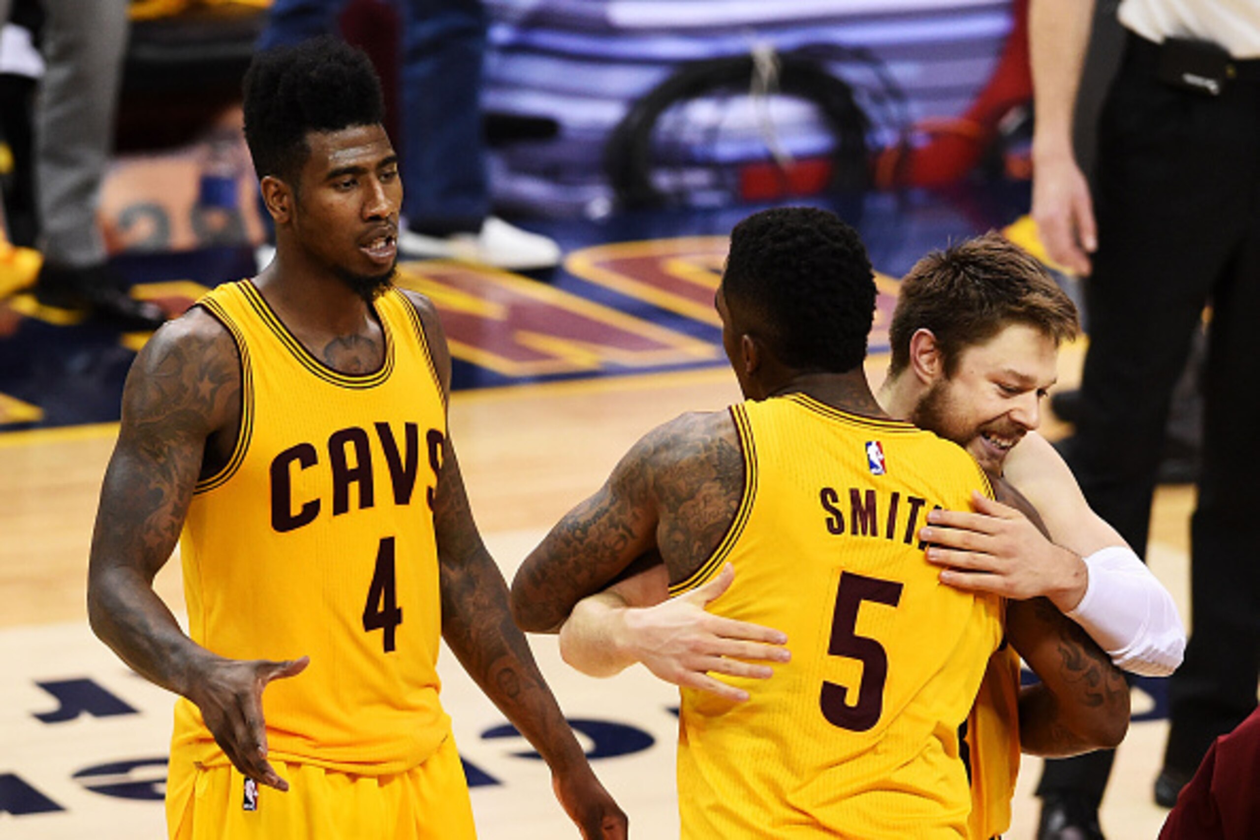 CLEVELAND, OH - MAY 24: Iman Shumpert #4, Matthew Dellavedova #8 and J.R. Smith #5 of the Cleveland Cavaliers react after their 114 to 111 win over the Atlanta Hawks in overtime during Game Three of the Eastern Conference Finals of the 2015 NBA Playoffs CLEVELAND, OH - MAY 24: Iman Shumpert #4, Matthew Dellavedova #8 and J.R. Smith #5 of the Cleveland Cavaliers react after their 114 to 111 win over the Atlanta Hawks in overtime during Game Three of the Eastern Conference Finals of the 2015 NBA Playoffs