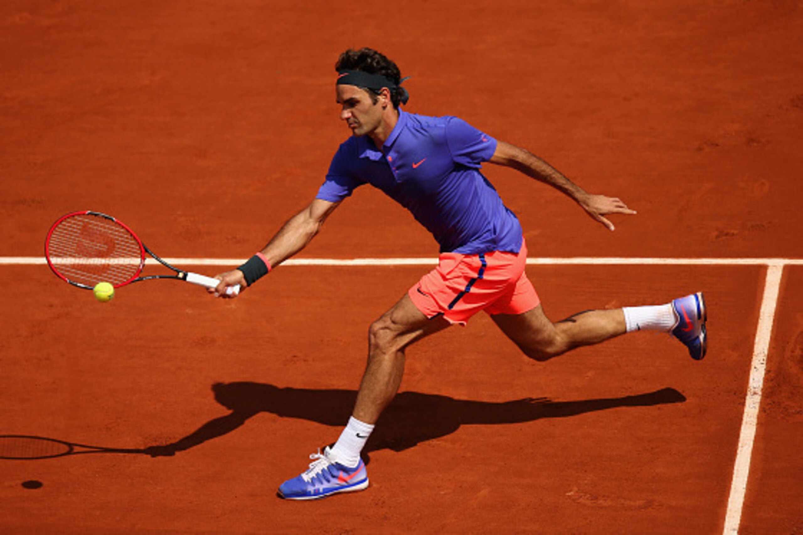 PARIS, FRANCE - MAY 27:  Roger Federer of Switzerland plays a forehand during his Men's Singles match against Marcel Granollers of Spain during day four of the 2015 French Open at Roland Garros on May 27, 2015 in Paris, France.  (Photo by Clive Mason/Gett
