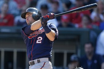 CHICAGO, IL - MAY 23: Brian Dozier #2 of the Minnesota Twins hits a RBI double in the third inning against the Chicago White Sox at U.S. Cellular Field on May 23, 2015 in Chicago, Illinois. (Photo by Mike McGinnis/Getty Images)