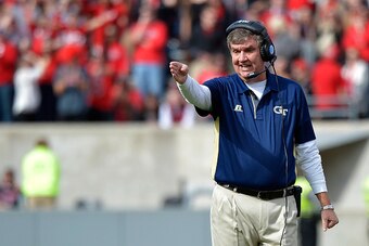 RALEIGH, NC - NOVEMBER 08:  Head coach Paul Johnson of the Georgia Tech Yellow Jackets  directs his team against the North Carolina State Wolfpack during their game at Carter-Finley Stadium on November 8, 2014 in Raleigh, North Carolina.  (Photo by Grant 