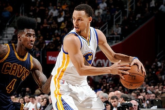 CLEVELAND, OH - FEBRUARY 26: Stephen Curry #30 of the Golden State Warriors handles the ball against the Cleveland Cavaliers at The Quicken Loans Arena on February 26, 2015 in Cleveland, Ohio. NOTE TO USER: User expressly acknowledges and agrees that, by 
