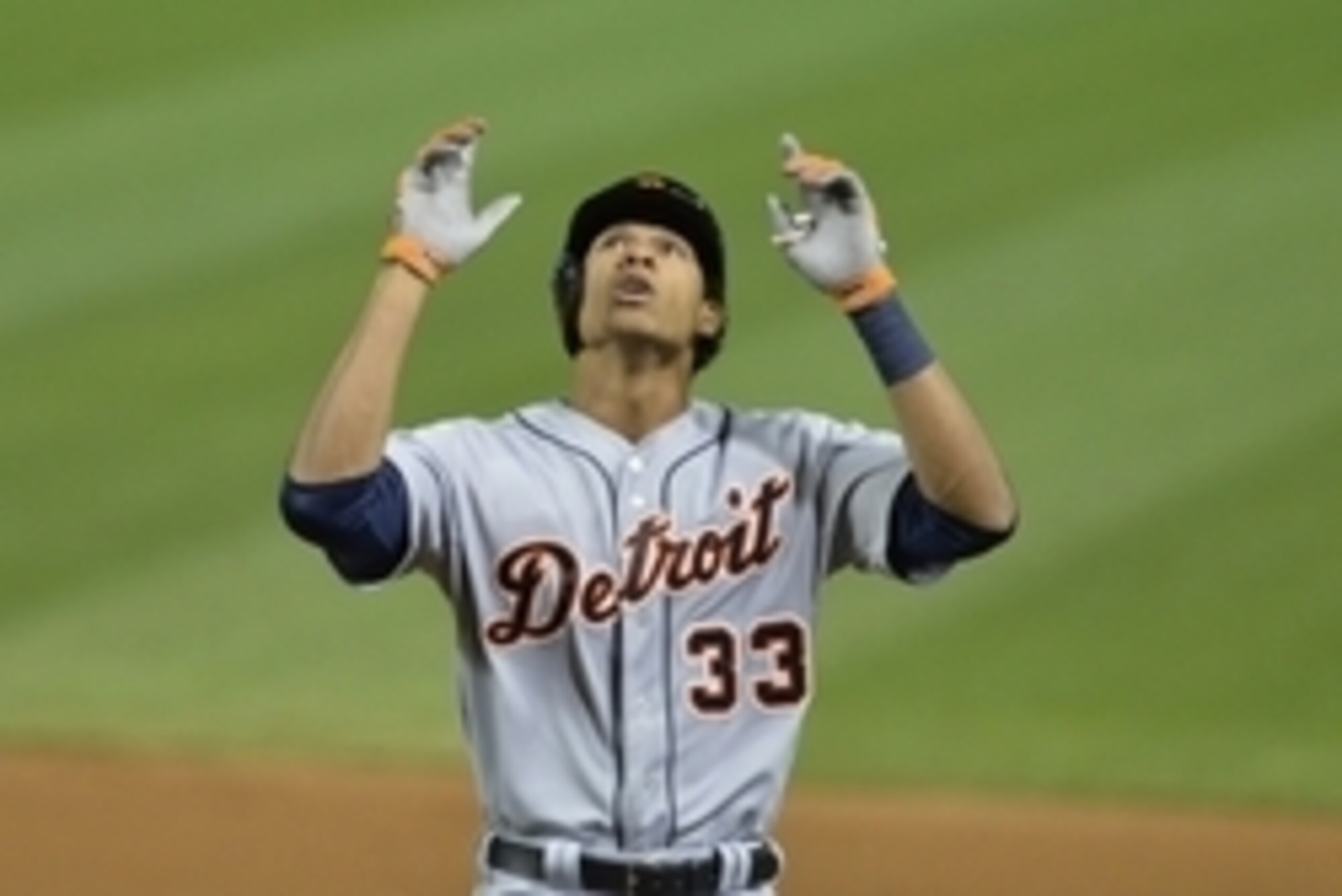 Sep 3, 2014; Cleveland, OH, USA; Detroit Tigers pinch hitter Steven Moya (33) celebrates his single in the ninth inning against the Cleveland Indians at Progressive Field. Mandatory Credit: David Richard-USA TODAY Sports