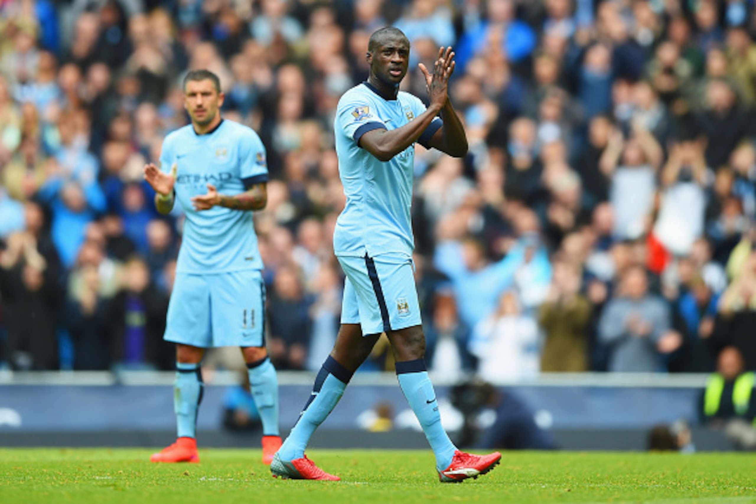 MANCHESTER, ENGLAND - MAY 24:  Yaya Toure of Manchester City applauds supporters as he is replaced during the Barclays Premier League match between Manchester City and Southampton at Etihad Stadium on May 24, 2015 in Manchester, England.  (Photo by Shaun 