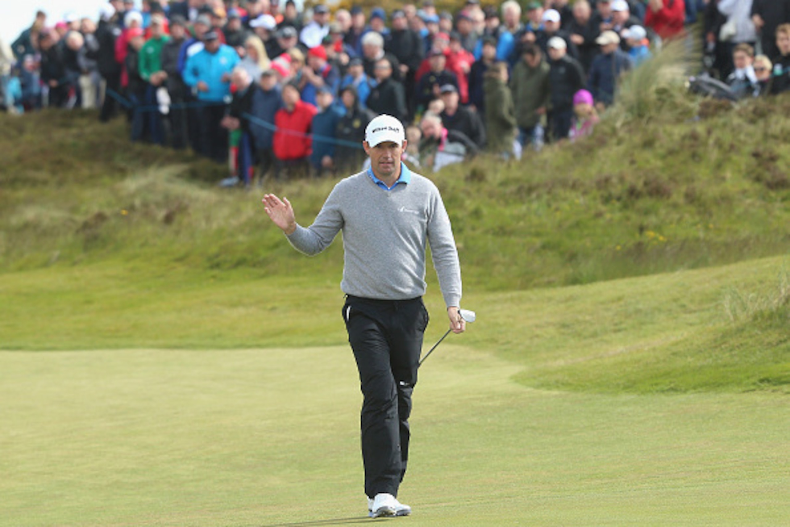 NEWCASTLE, NORTHERN IRELAND - MAY 29:  Padraig Harrington of Ireland acknowledges the crowd on the 18th green during the Second Round of the Dubai Duty Free Irish Open Hosted by the Rory Foundation at Royal County Down Golf Club on May 29, 2015 in Newcast