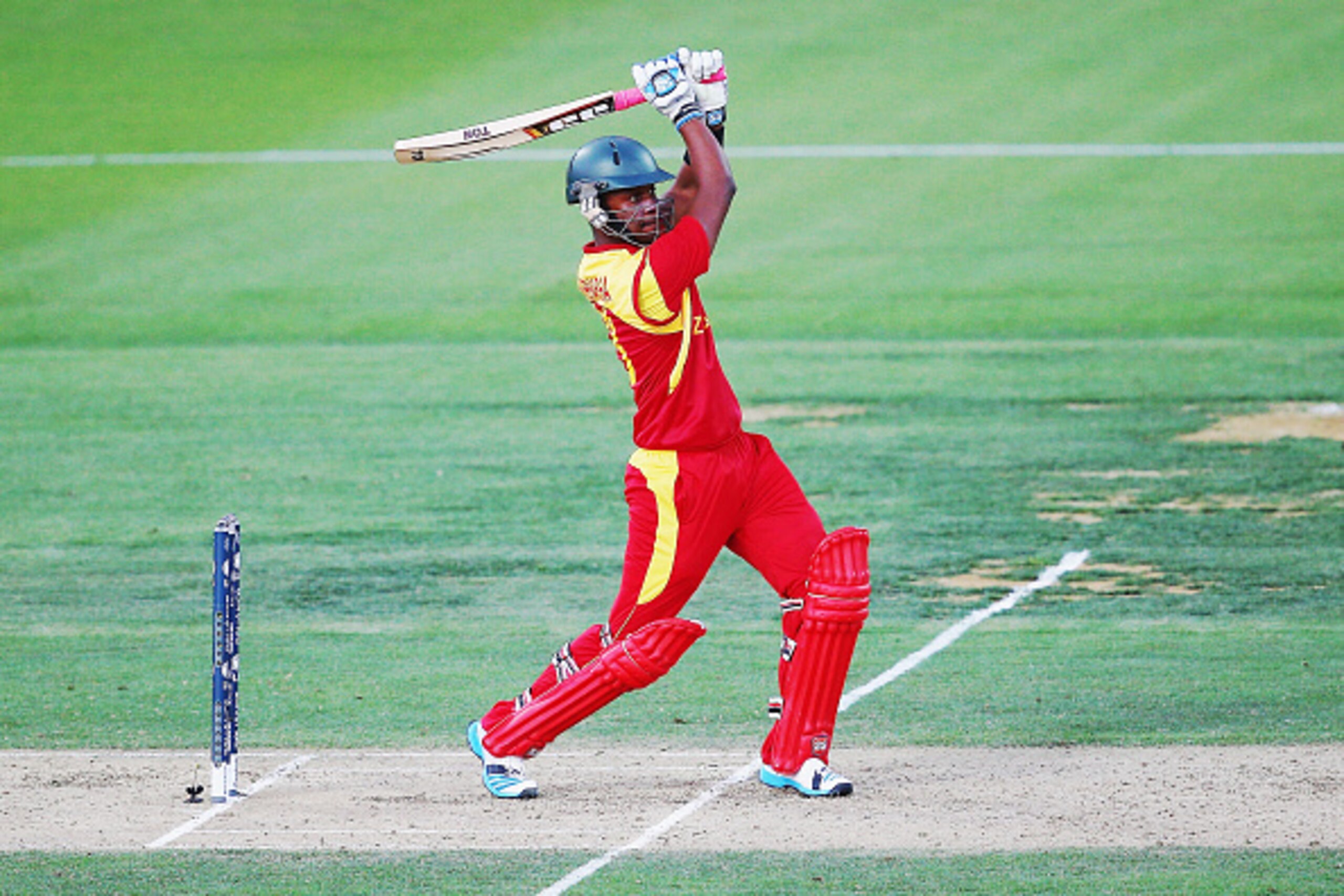 HAMILTON, NEW ZEALAND - FEBRUARY 15:  Chamu Chibhabha of Zimbabwe pulls the ball away for six runs during the 2015 ICC Cricket World Cup match between South Africa and Zimbabwe at Seddon Park on February 15, 2015 in Hamilton, New Zealand.  (Photo by Hanna