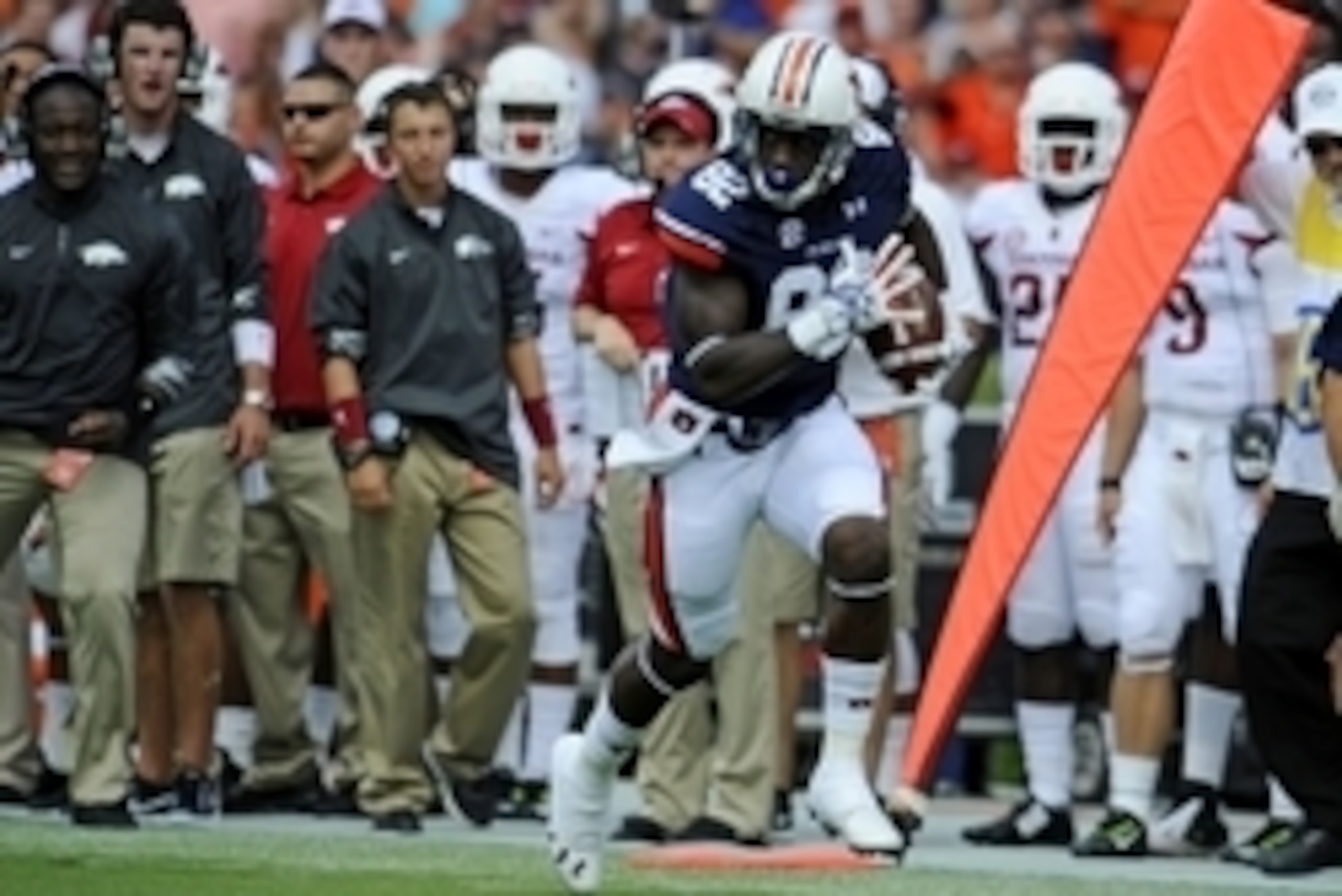 Aug 30, 2014; Auburn, AL, USA; Auburn Tigers wide receiver Melvin Ray (82) scores a touchdown in the first quarter against the Arkansas Razorbacks at Jordan Hare Stadium. Mandatory Credit: Shanna Lockwood-USA TODAY Sports Aug 30, 2014; Auburn, AL, USA; Auburn Tigers wide receiver Melvin Ray (82) scores a touchdown in the first quarter against the Arkansas Razorbacks at Jordan Hare Stadium. Mandatory Credit: Shanna Lockwood-USA TODAY Sports