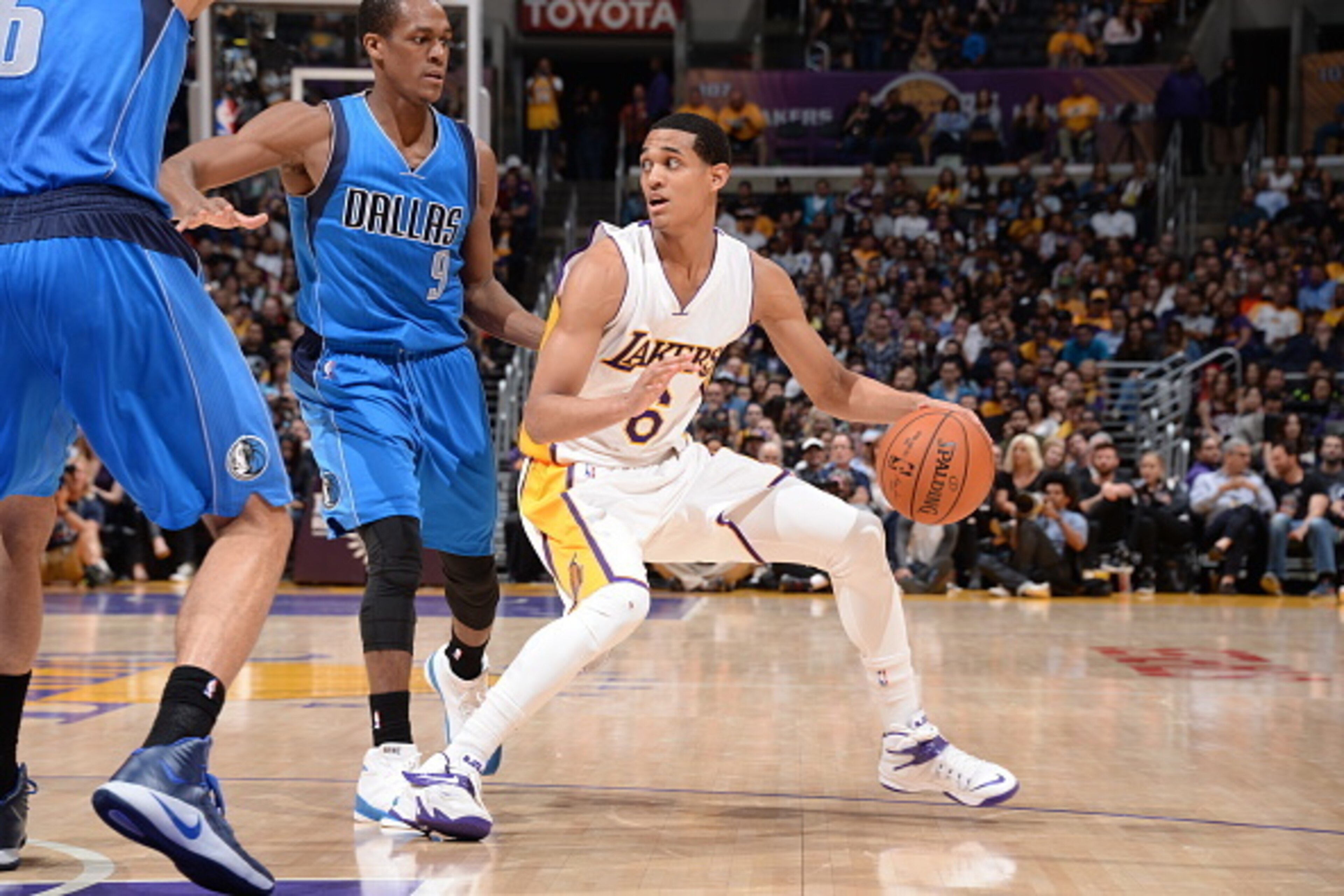 LOS ANGELES, CA - APRIL 12: Jordan Clarkson #6 of the Los Angeles Lakers handles the ball against the Dallas Mavericks on April 12, 2015 at Staples Center in Los Angeles, California. NOTE TO USER: User expressly acknowledges and agrees that, by downloadi LOS ANGELES, CA - APRIL 12: Jordan Clarkson #6 of the Los Angeles Lakers handles the ball against the Dallas Mavericks on April 12, 2015 at Staples Center in Los Angeles, California. NOTE TO USER: User expressly acknowledges and agrees that, by downloadi