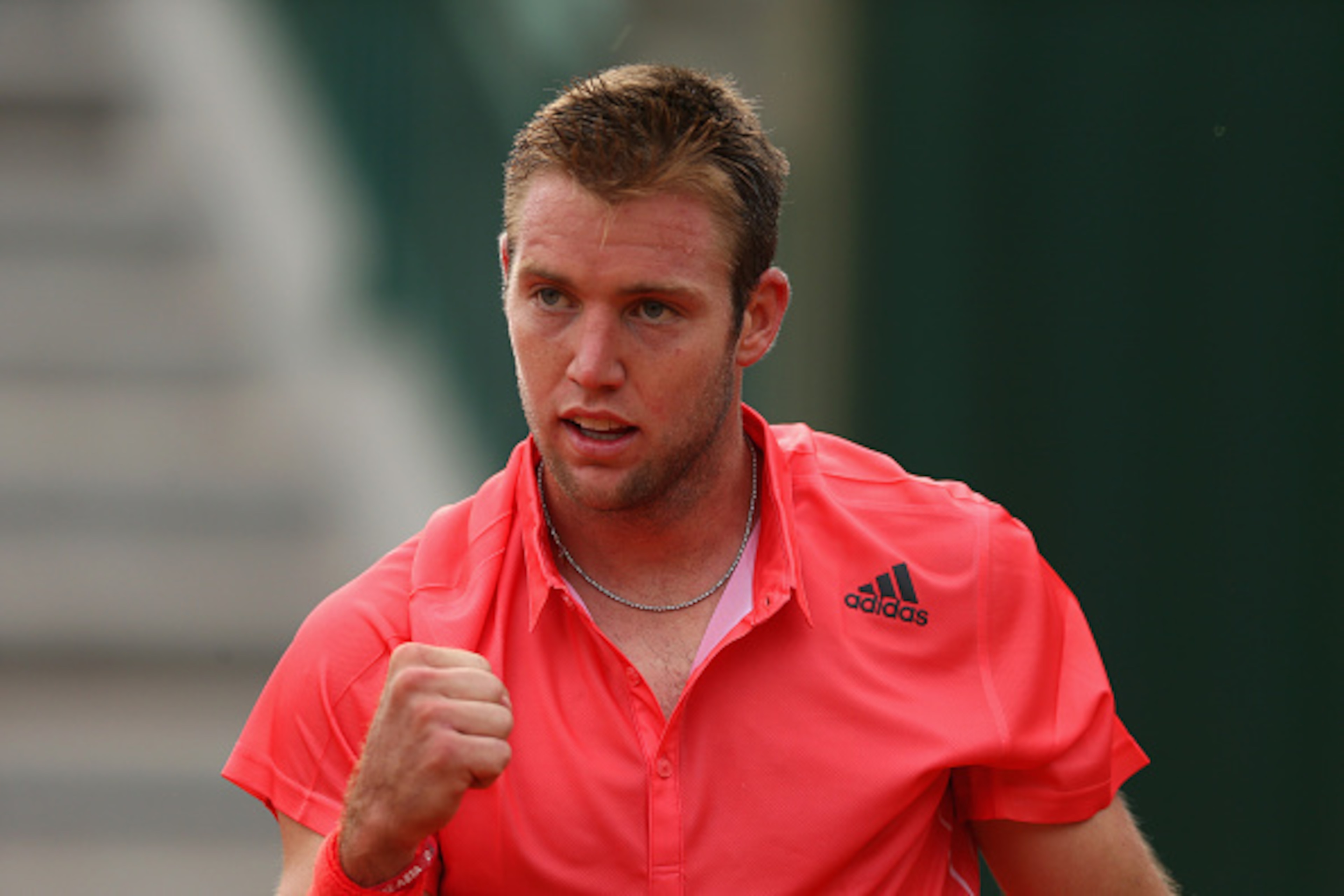 PARIS, FRANCE - MAY 28:  Jack Sock of the United States celebrates a point during his Men's Singles match against Pablo Caerreno Busta of Spain on day five of the 2015 French Open at Roland Garros on May 28, 2015 in Paris, France.  (Photo by Clive Brunski
