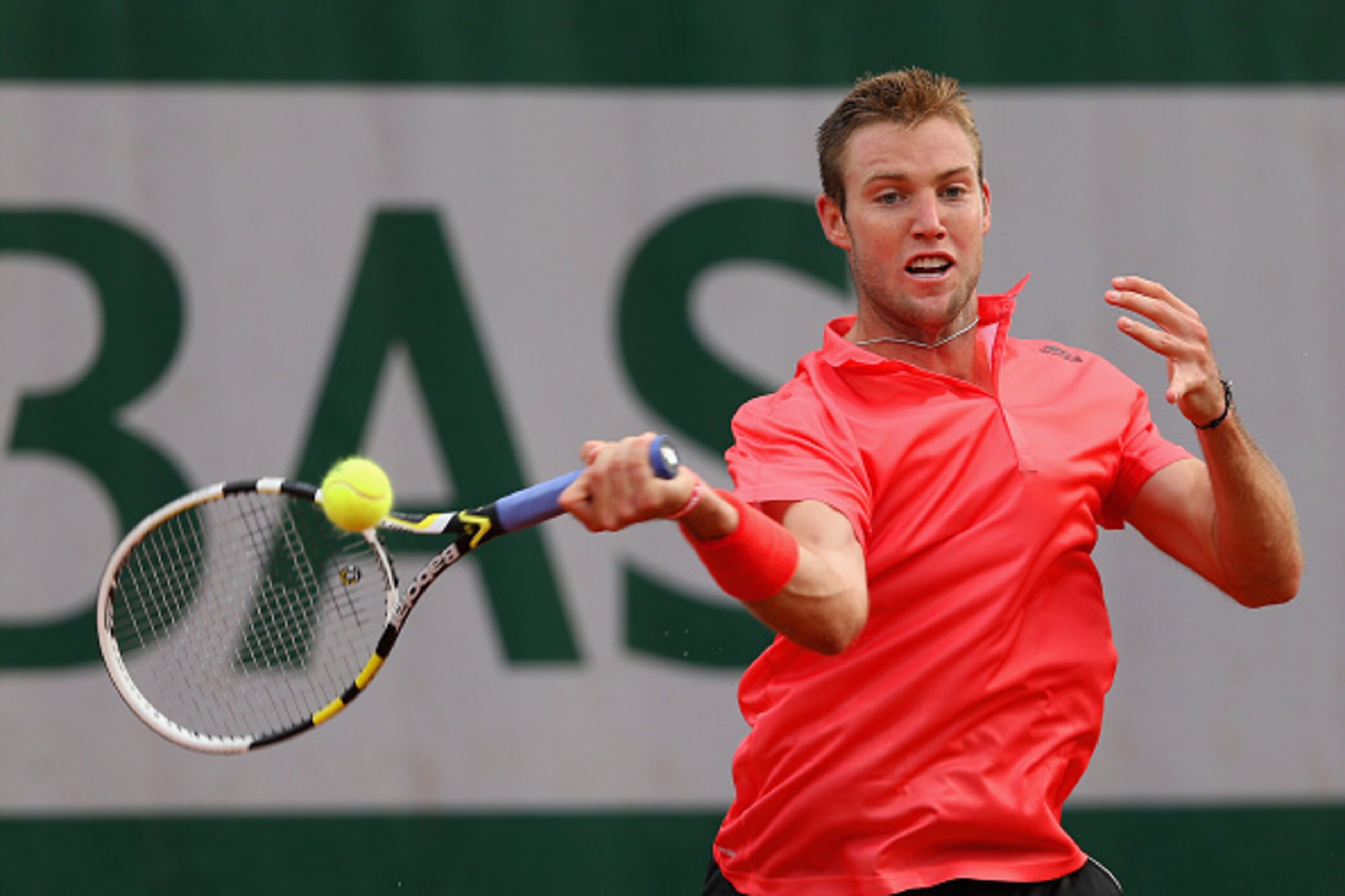 PARIS, FRANCE - MAY 28:  Jack Sock of the United States plays a forehand during his Men's Singles match against Pablo Caerreno Busta of Spain on day five of the 2015 French Open at Roland Garros on May 28, 2015 in Paris, France.  (Photo by Clive Brunskill